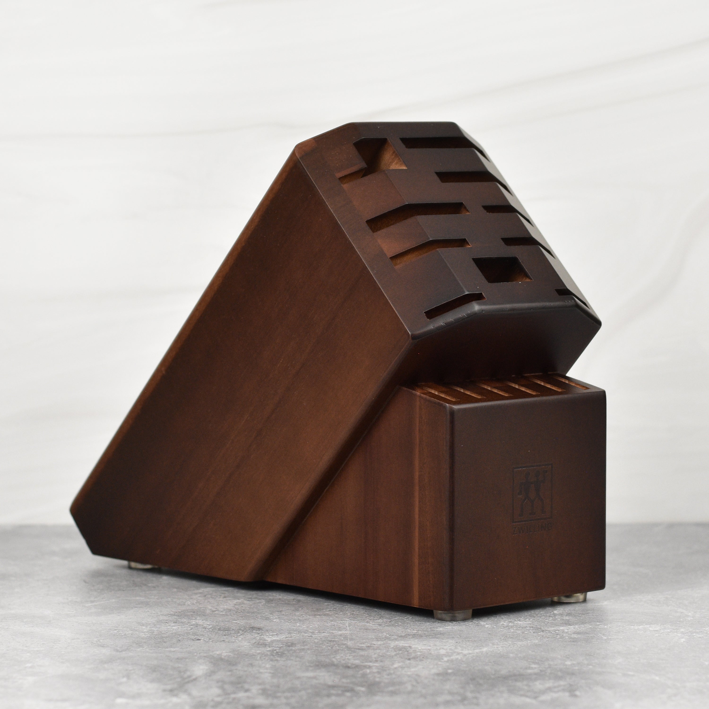 Elegant acacia knife holder showcasing kitchen knives and shears.
