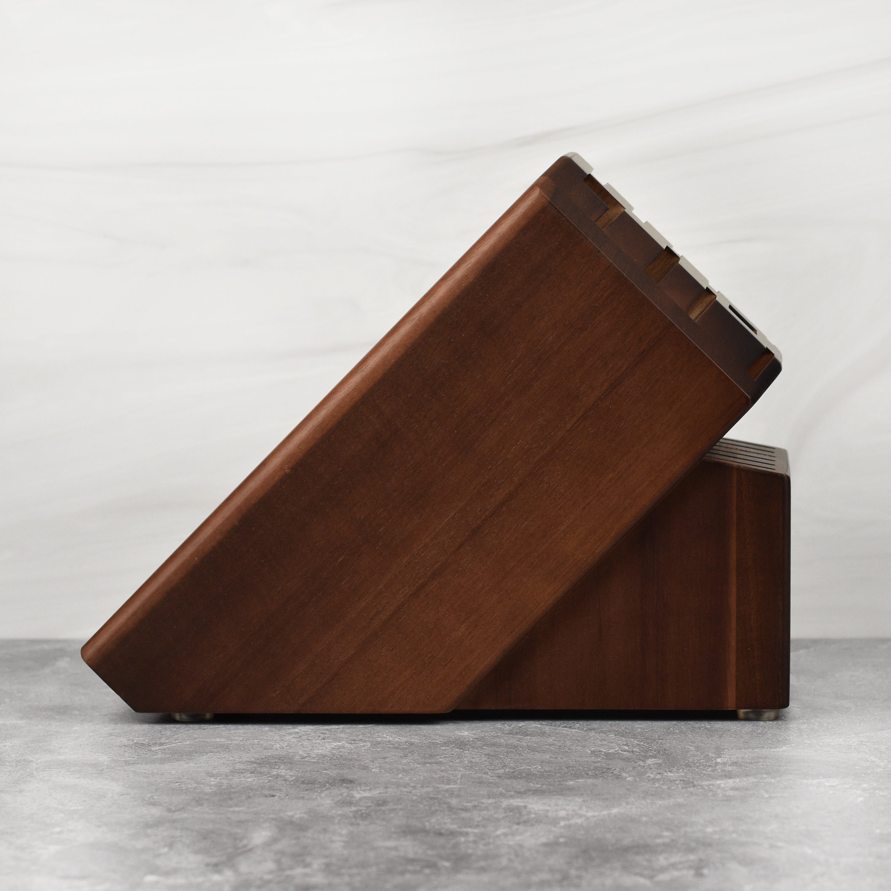 Close-up of the Zwilling Pro knife block highlighting its durable acacia wood.