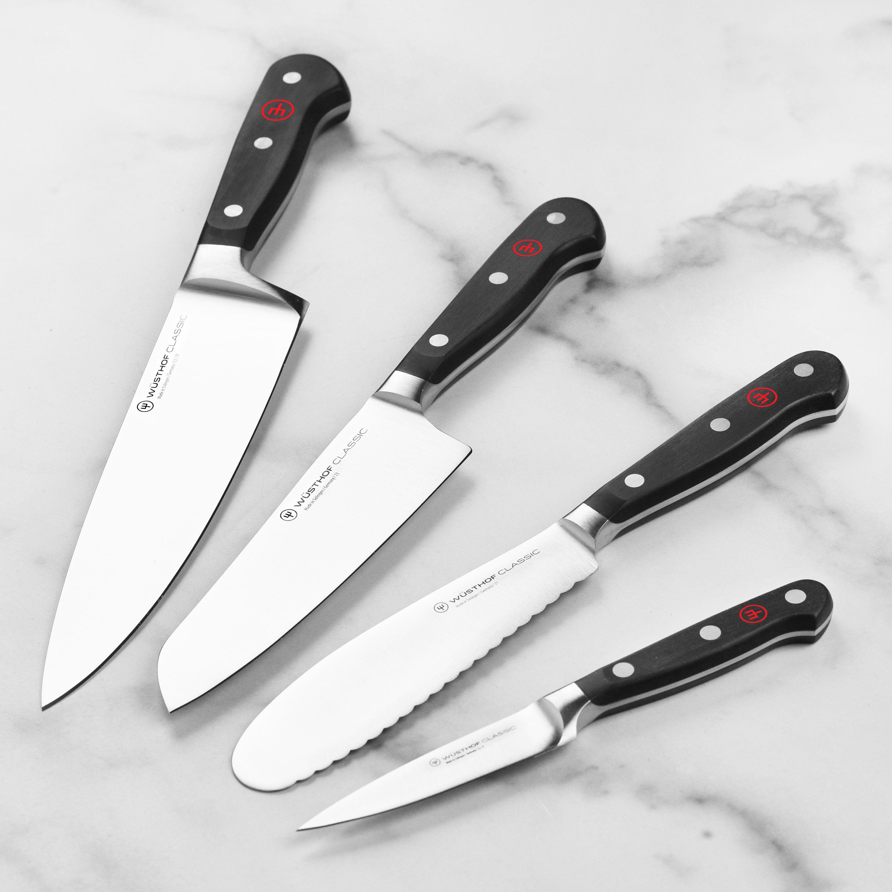 Polyoxymethylene handle of the Wusthof Classic knife, highlighting the Trident logo and craftsmanship
