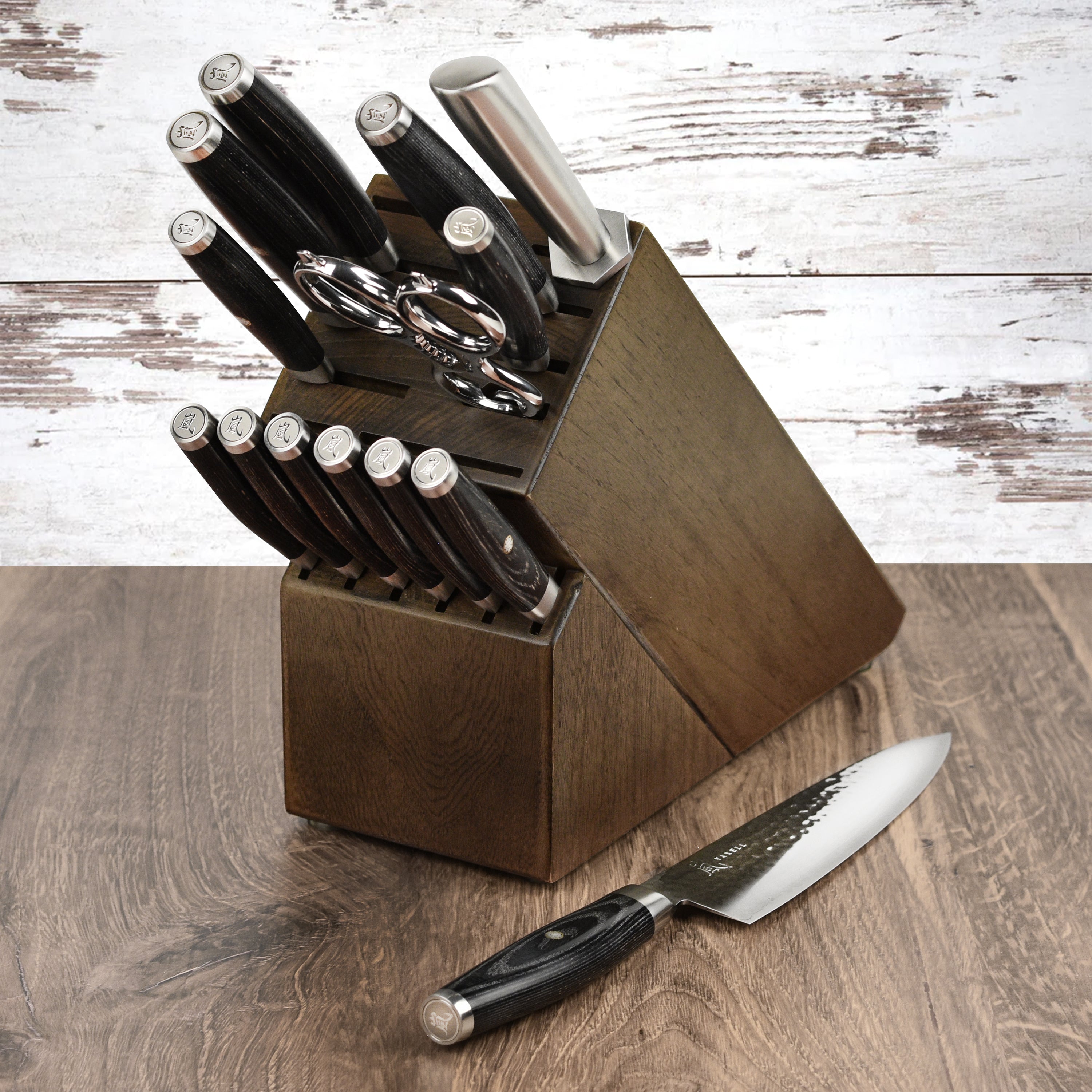 Elegant presentation of the Yaxell Ketu knife block set on a kitchen countertop.