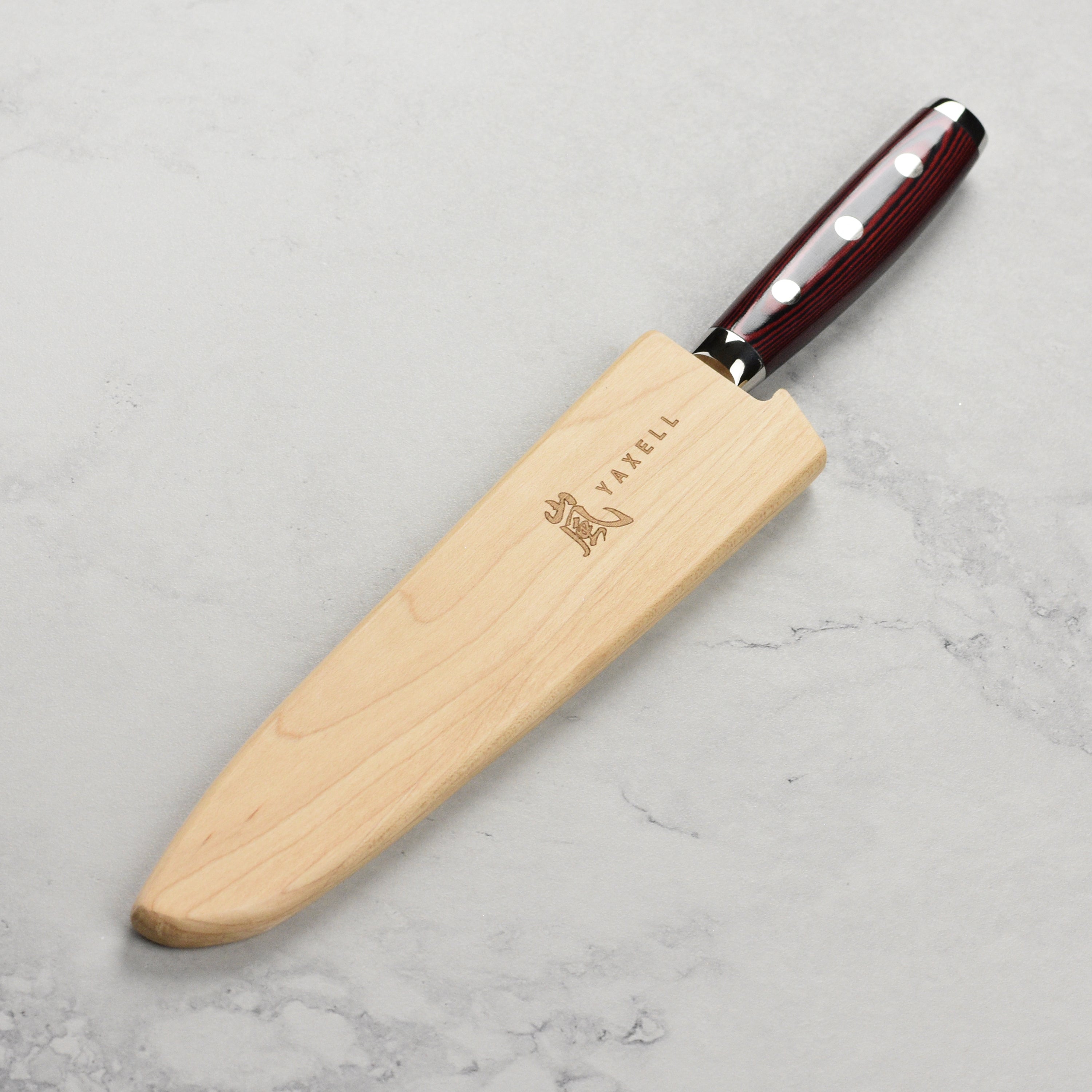 Yaxell knife sheath displayed with a 6-inch utility knife securely held in place.