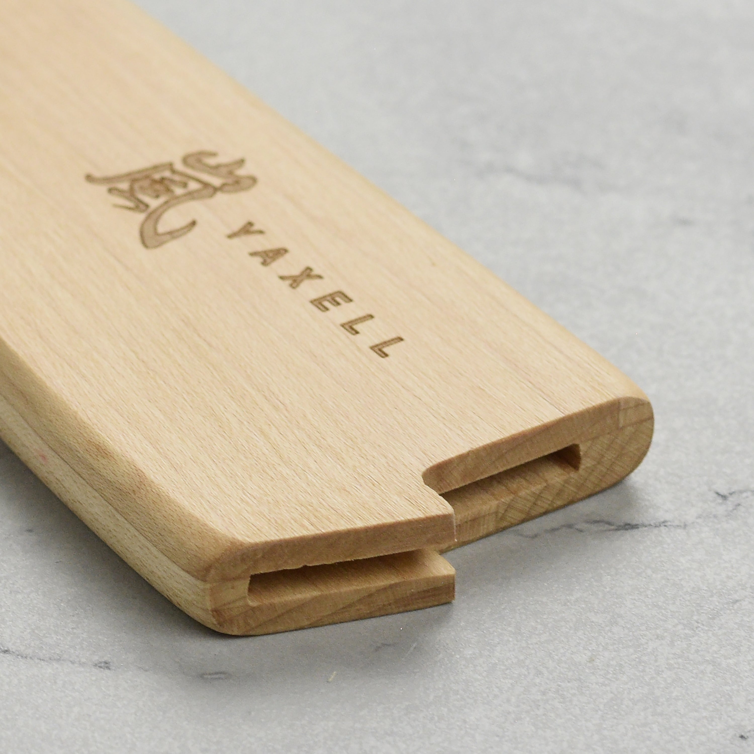 Lifestyle image of the magnetic knife holder in a modern kitchen setting, emphasizing its elegant appearance.