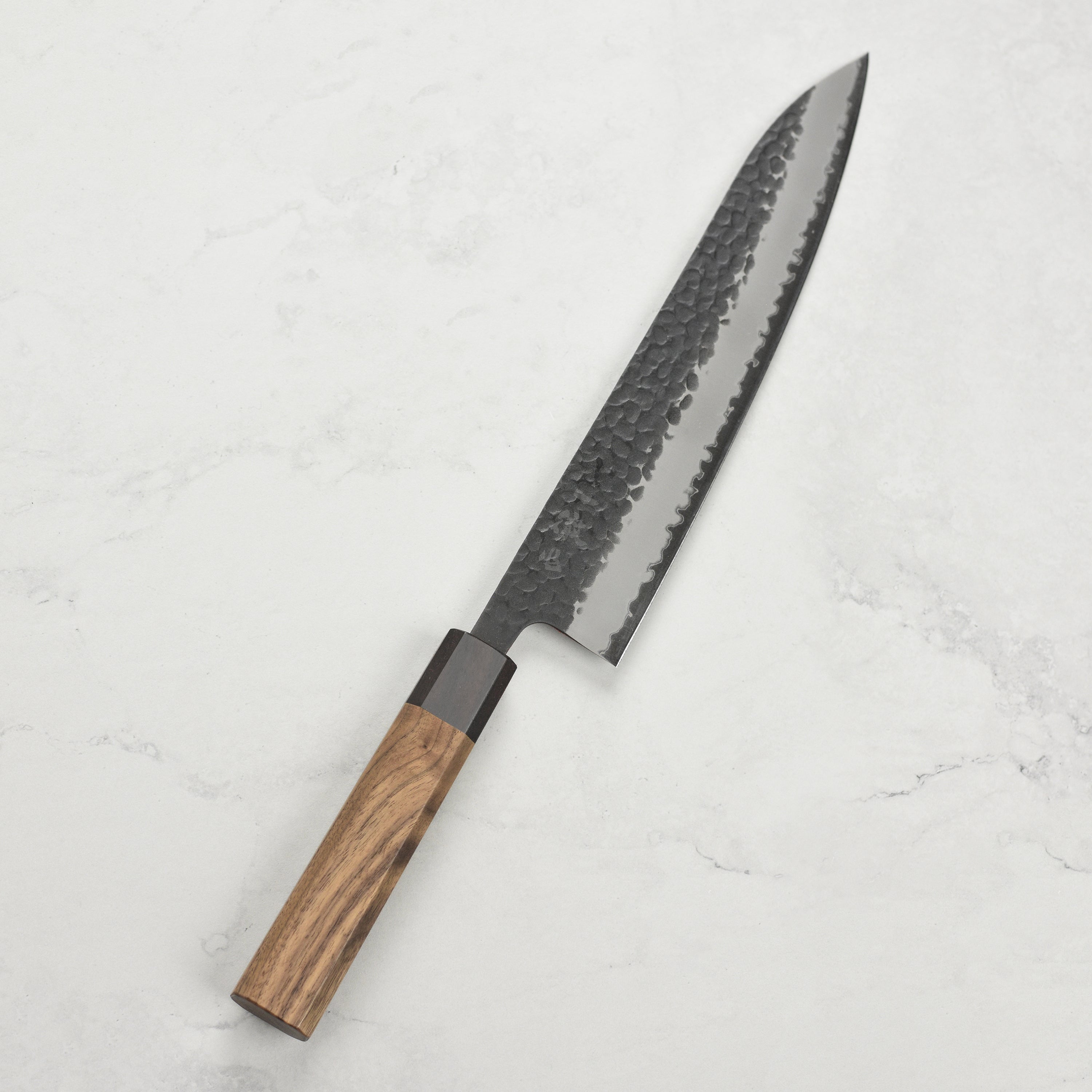 Top view of Japanese chef knife with traditional handle design