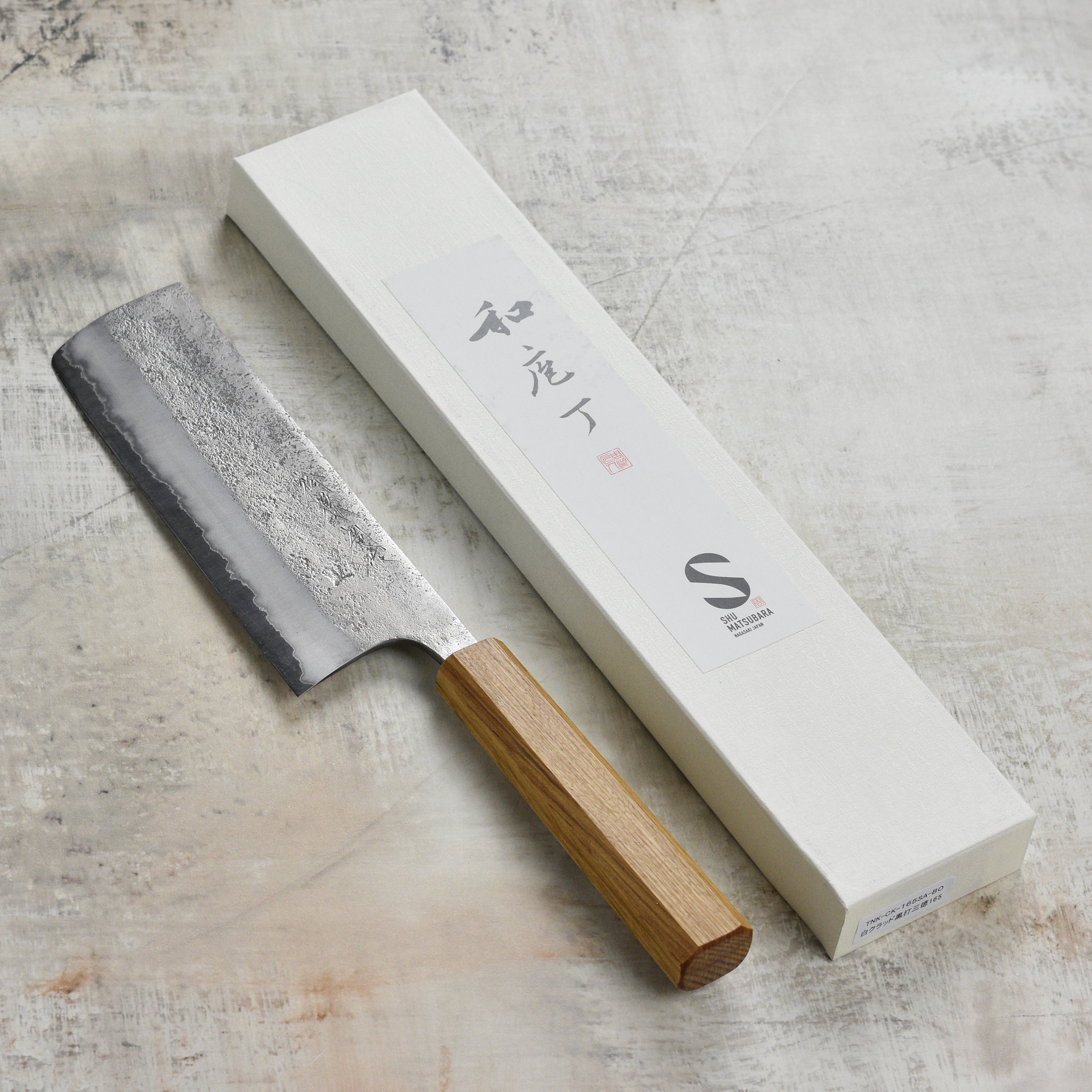 Close-up of the sharp edge of the stainless steel knife showing durability and precision