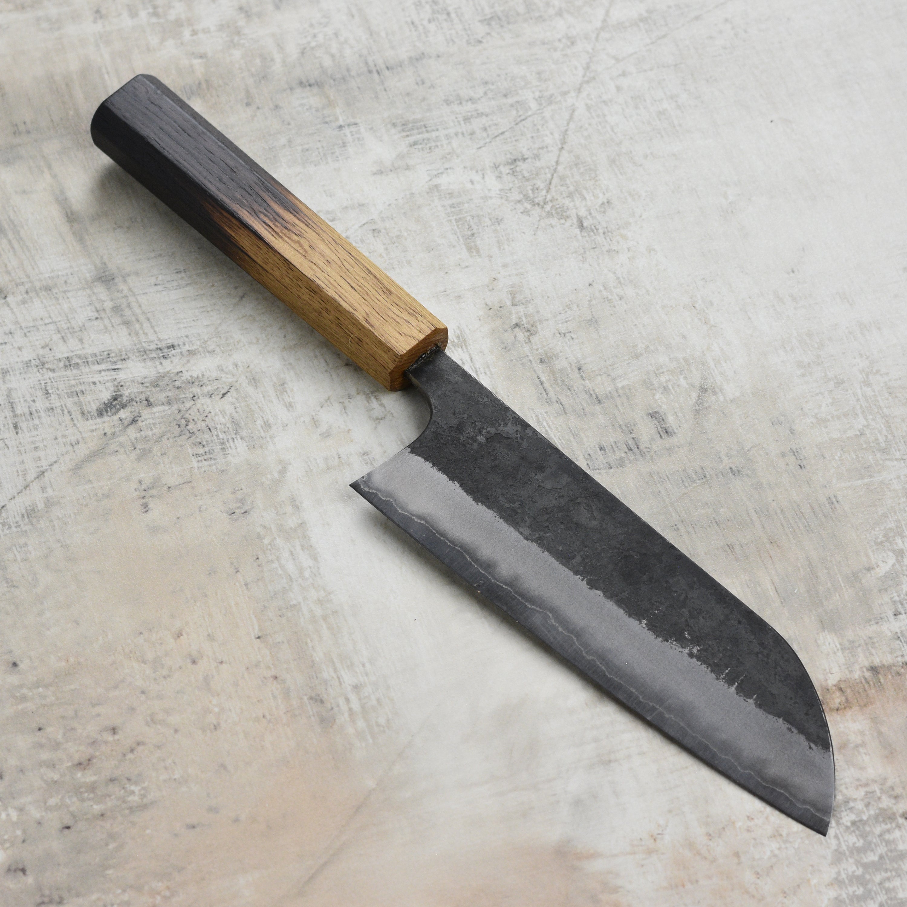 Close-up of the stainless clad edge of a premium santoku knife