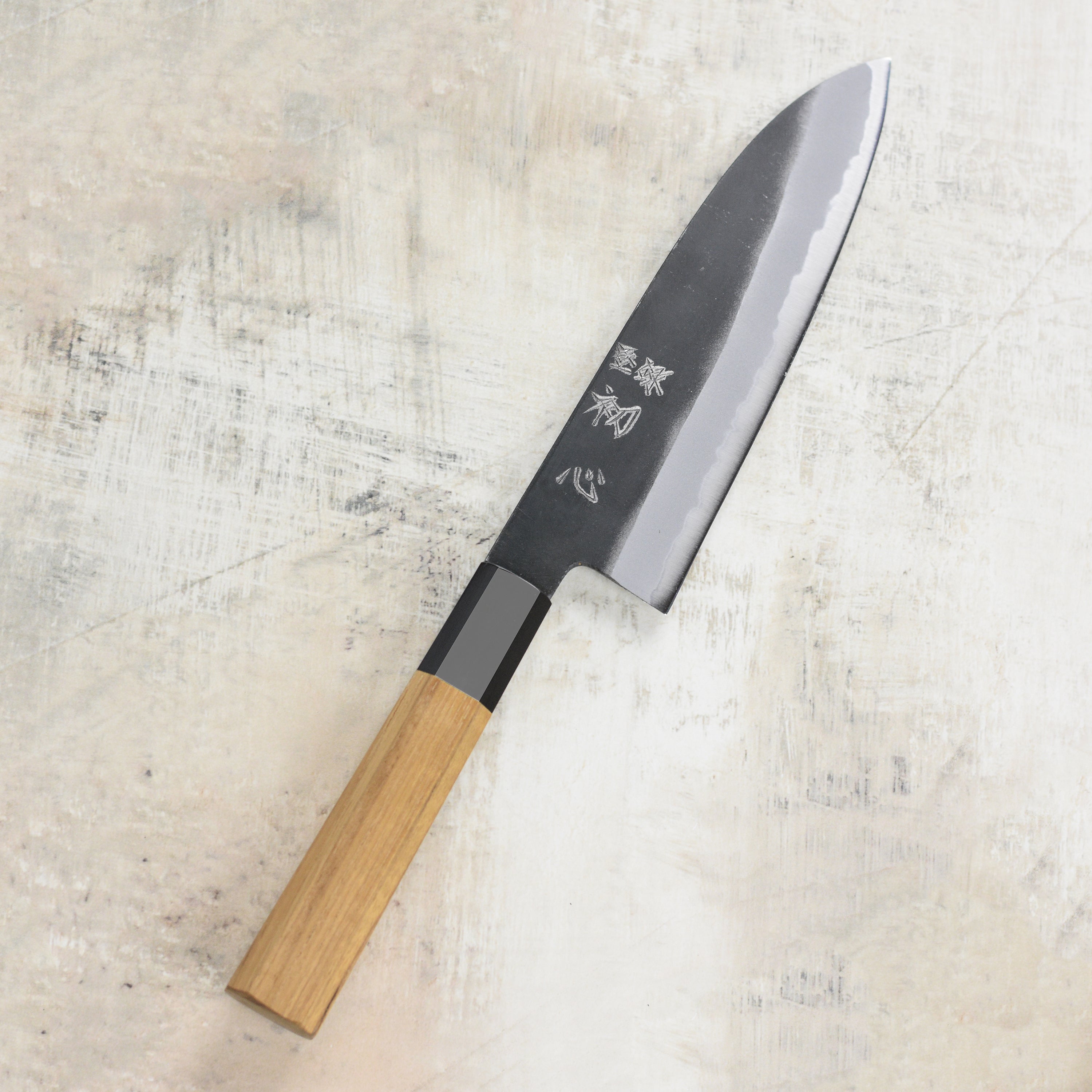 Close-up of the sharp edge on Hatsukokoro Aosagi 7-inch chef knife