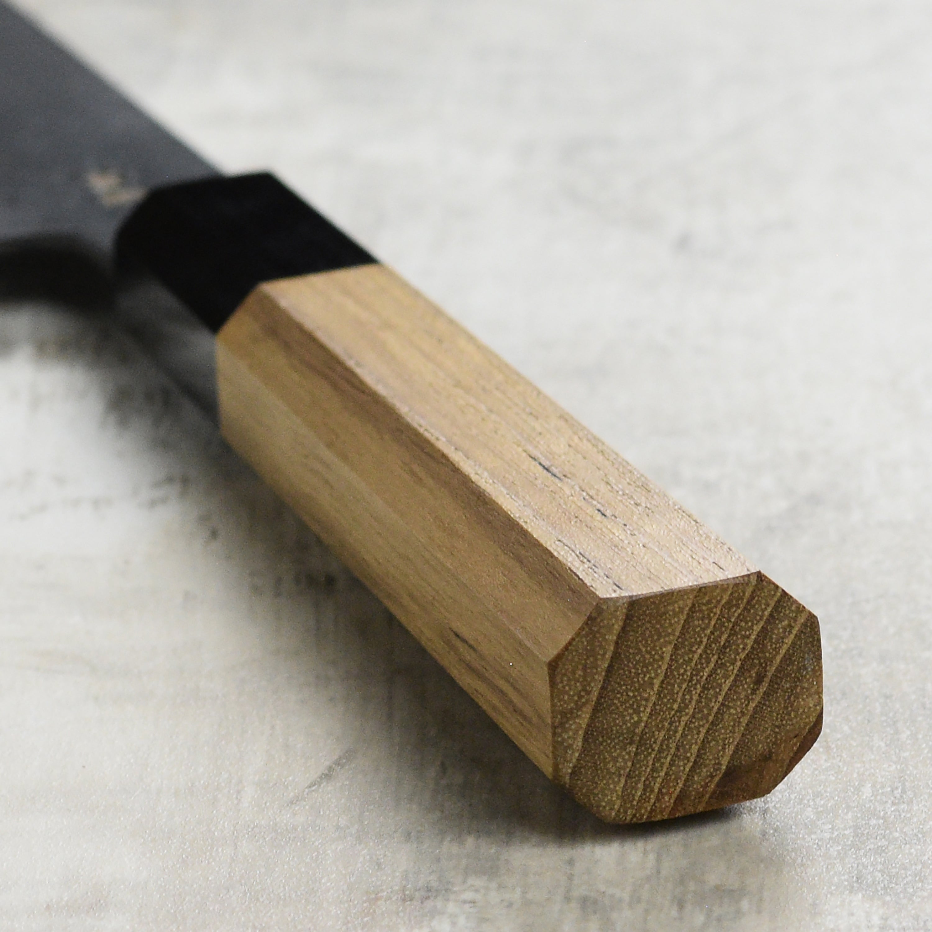 Close-up of the sharp edge on Hatsukokoro Aosagi 7-inch chef knife