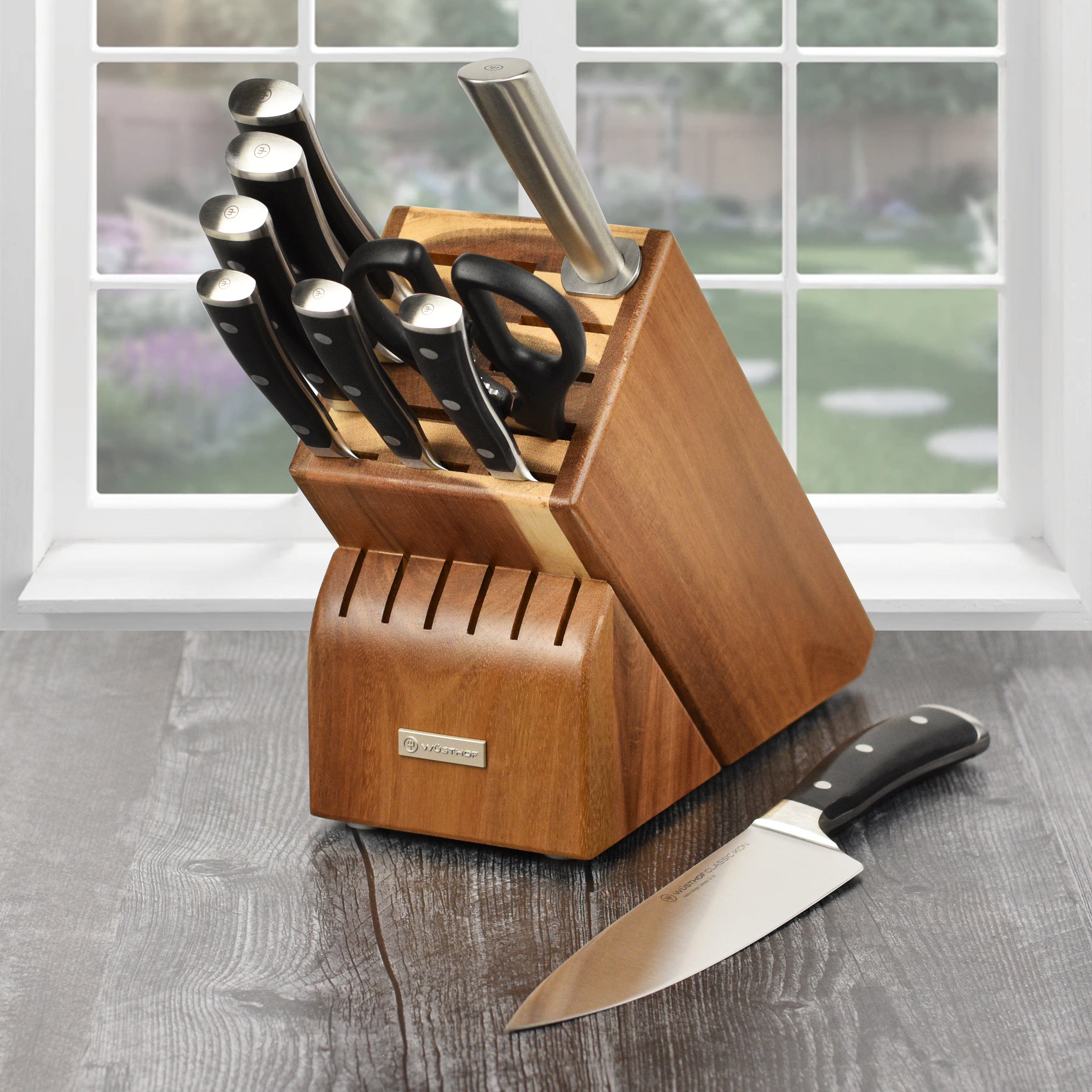 Ergonomic handles of Wusthof Classic Ikon knives for comfortable grip