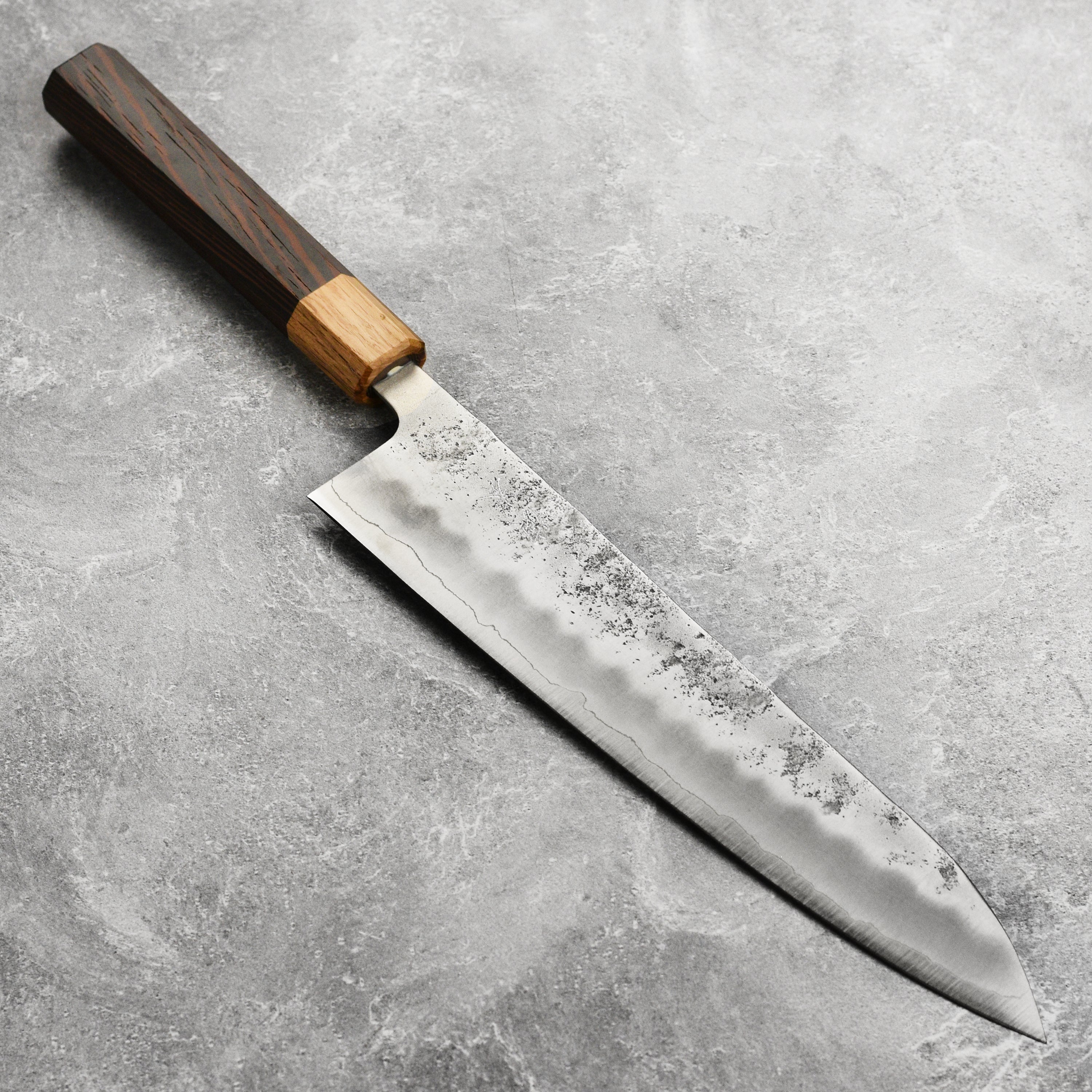 Close-up of the Enso Ginsan 9.4 inch gyuto blade showing craftsmanship and sharp edge