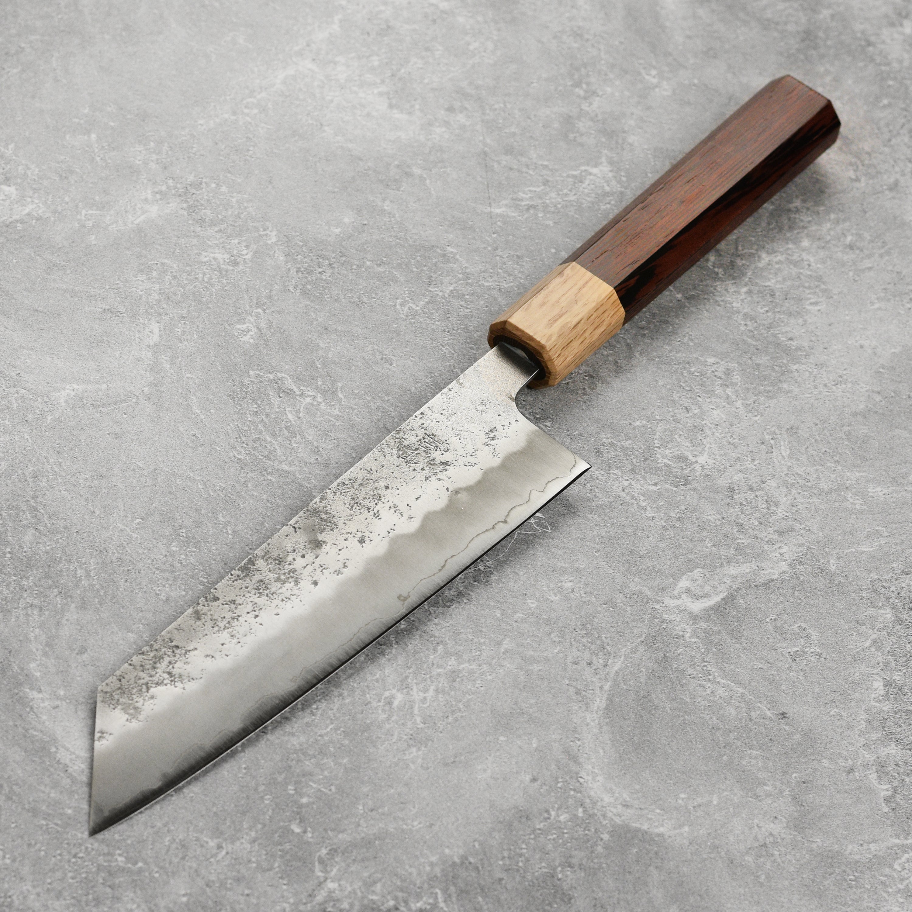 Gift-ready Enso Ginsan Bunka knife displayed on a wooden cutting board, perfect for culinary enthusiasts.