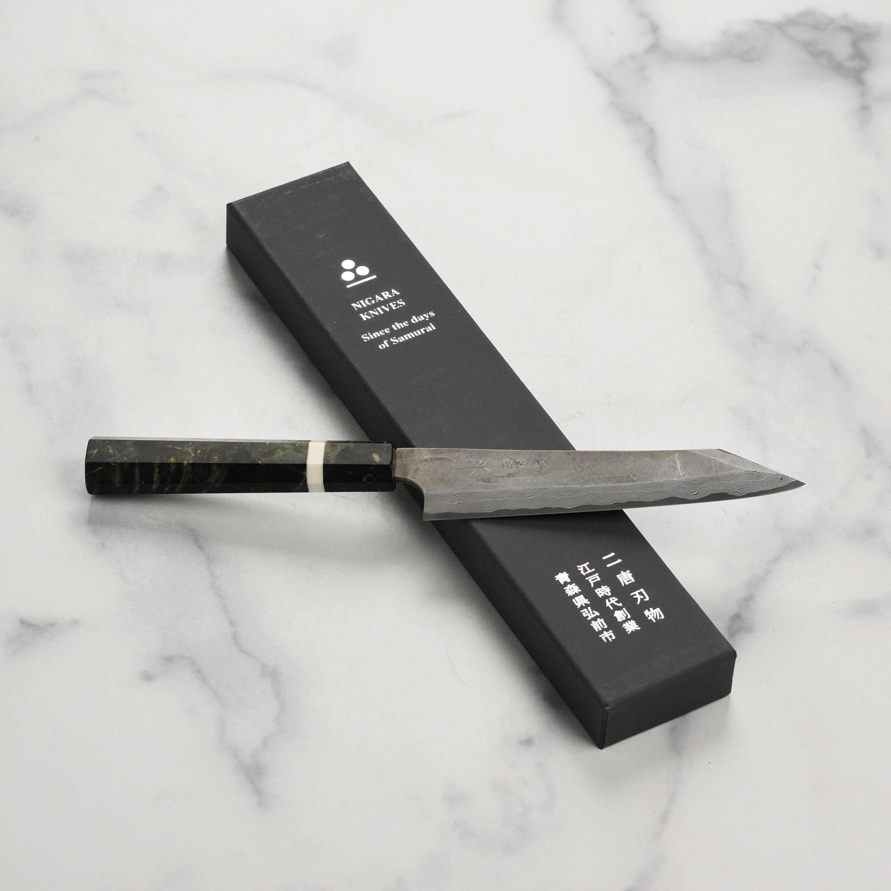 Nigara Ginsan Damascus kiritsuke petty knife with layered steel pattern for detailed cutting