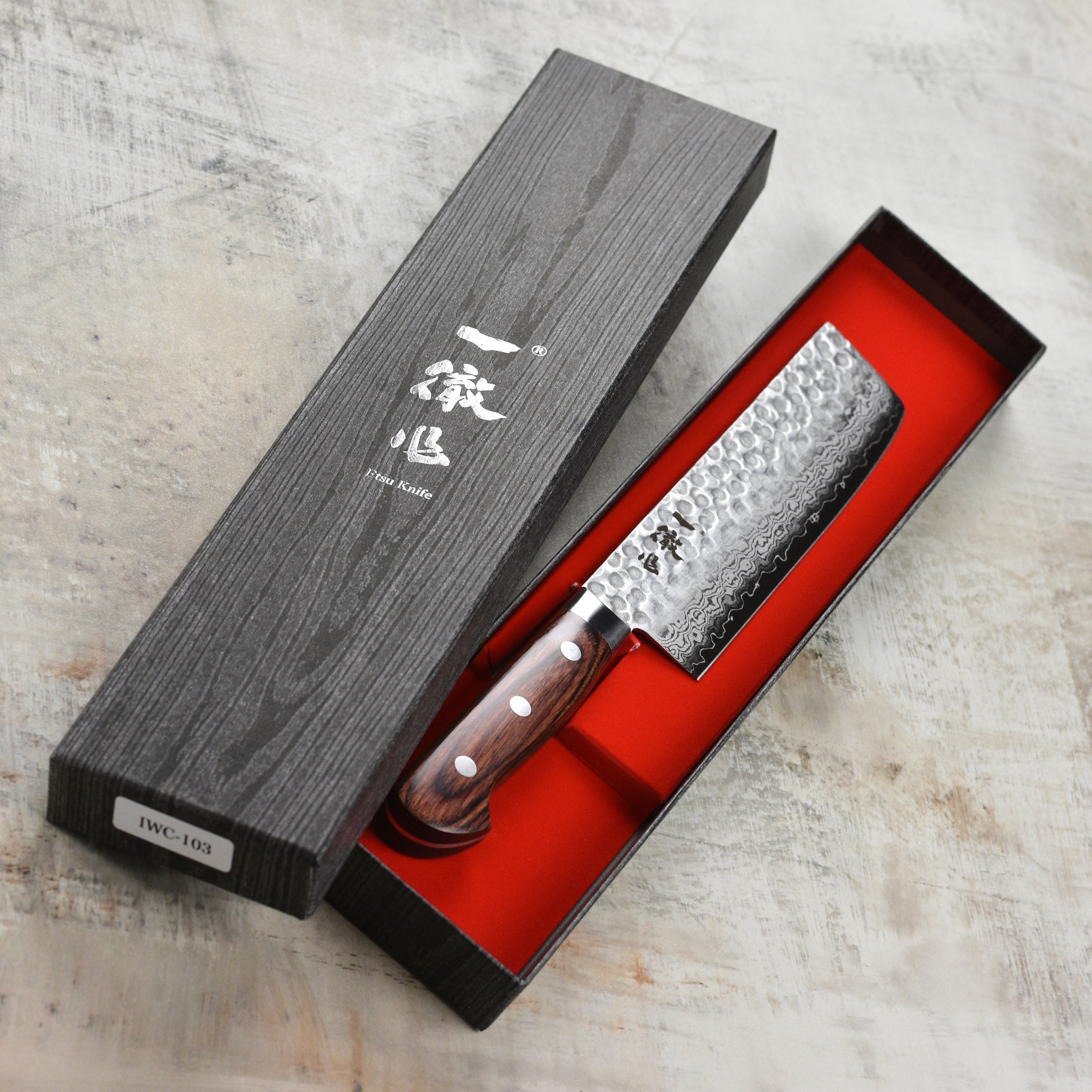 Ittetsu VG10 Hammered Damascus Nakiri Knife showcasing its blade and handle design.
