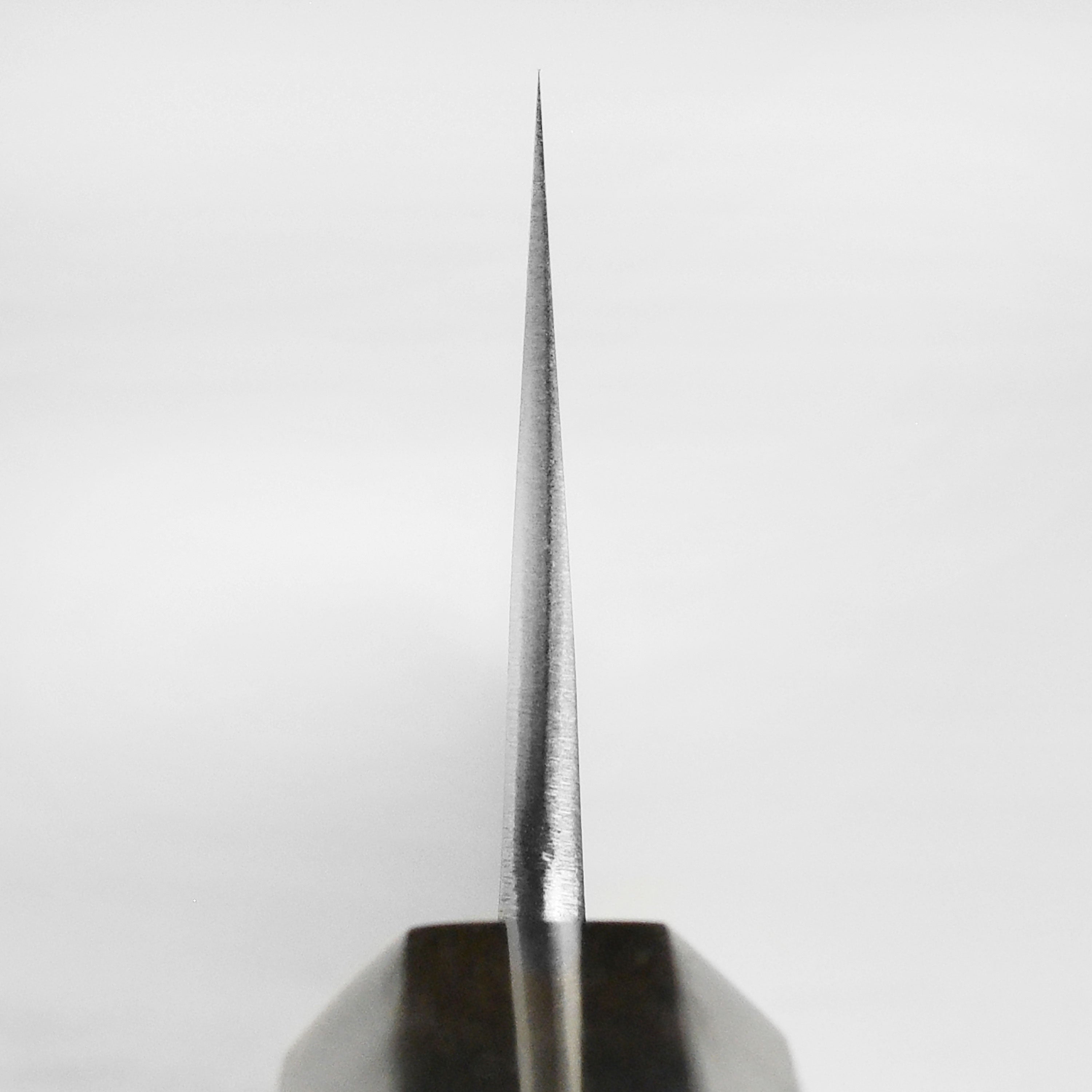 Yoshikane Shirogami #2 Nashiji gyuto chef knife with ebony handle, angled view