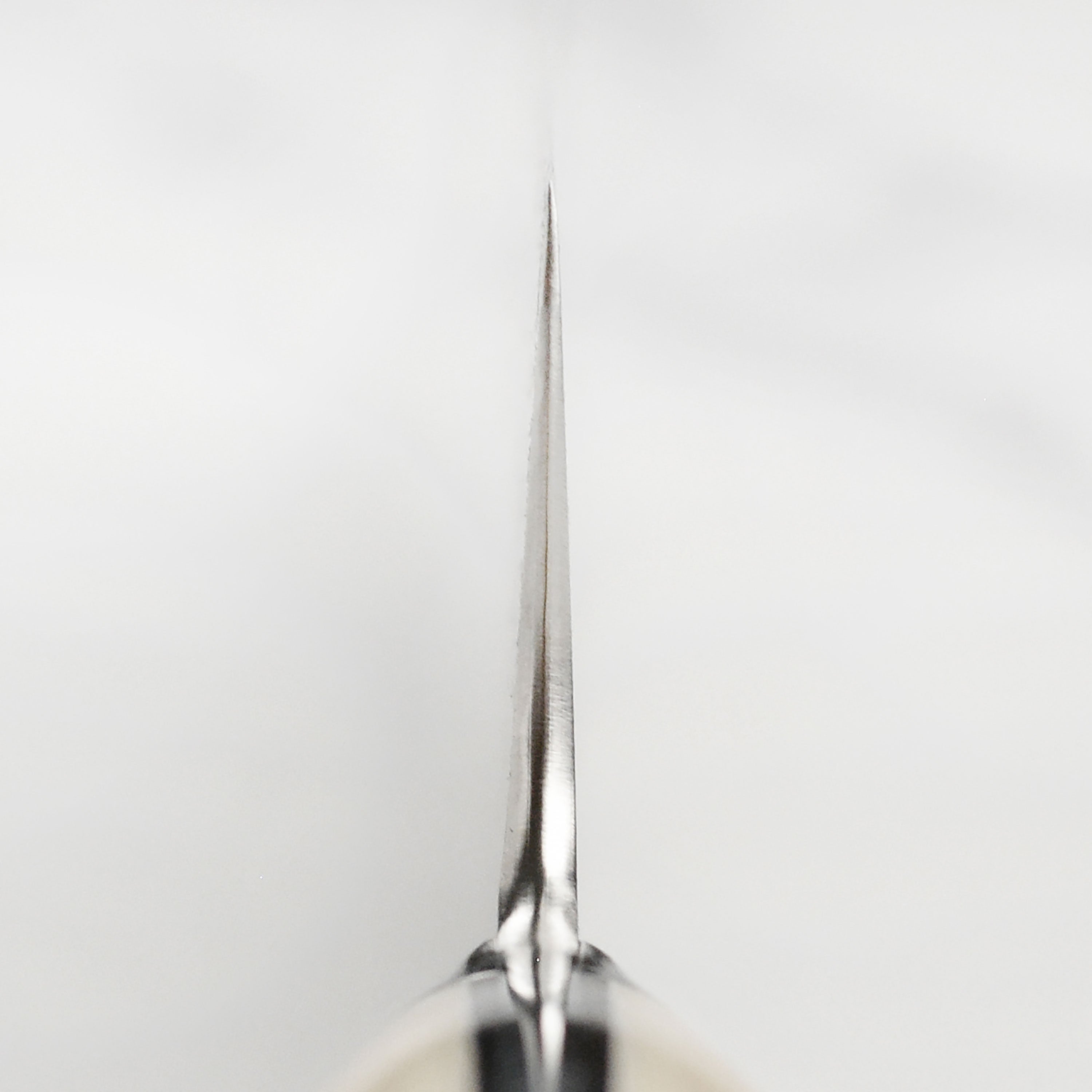 Close-up of the 101-layer blade with Damascus pattern on Japanese chef knife