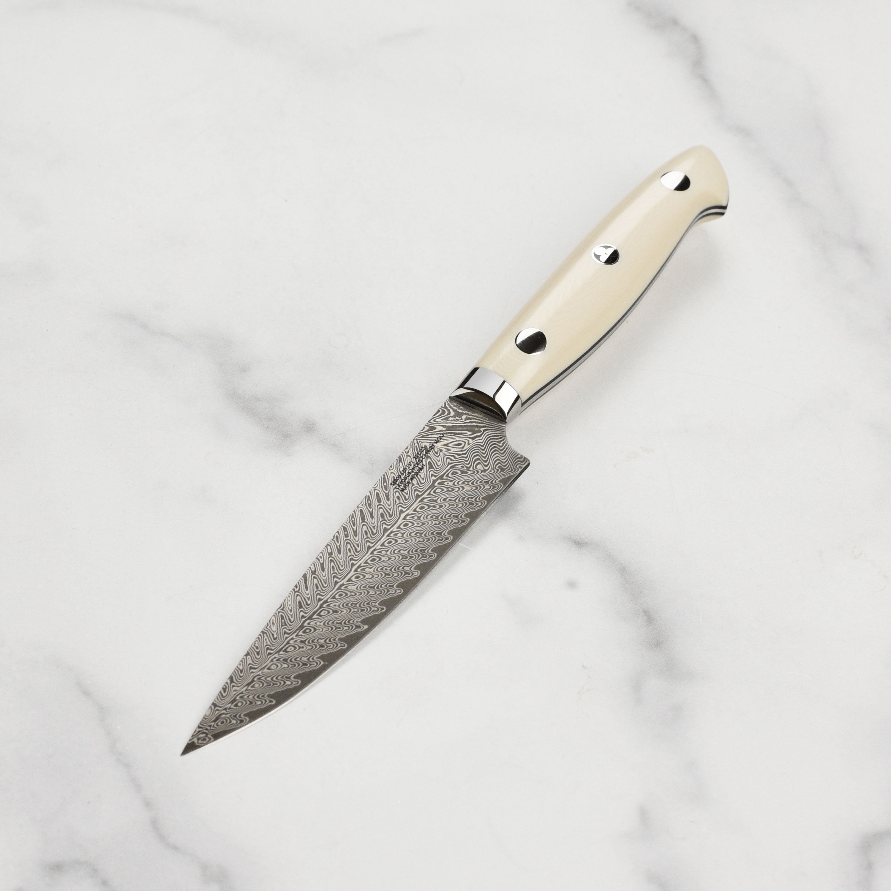 Kramer Cumulus Damascus utility knife with layered blade and ergonomic handle