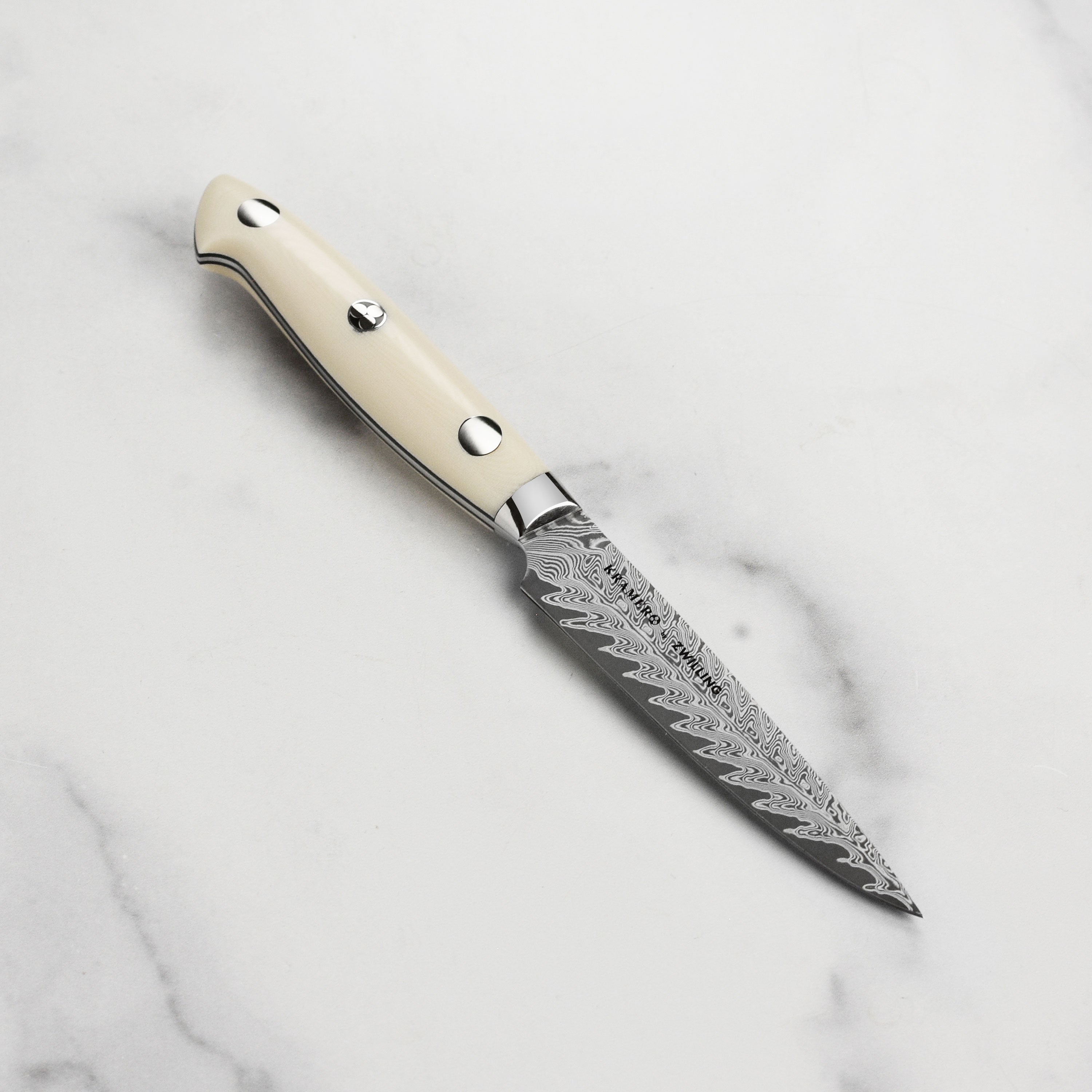Kramer Cumulus 4-inch Japanese paring knife with Damascus blade and white micarta handle