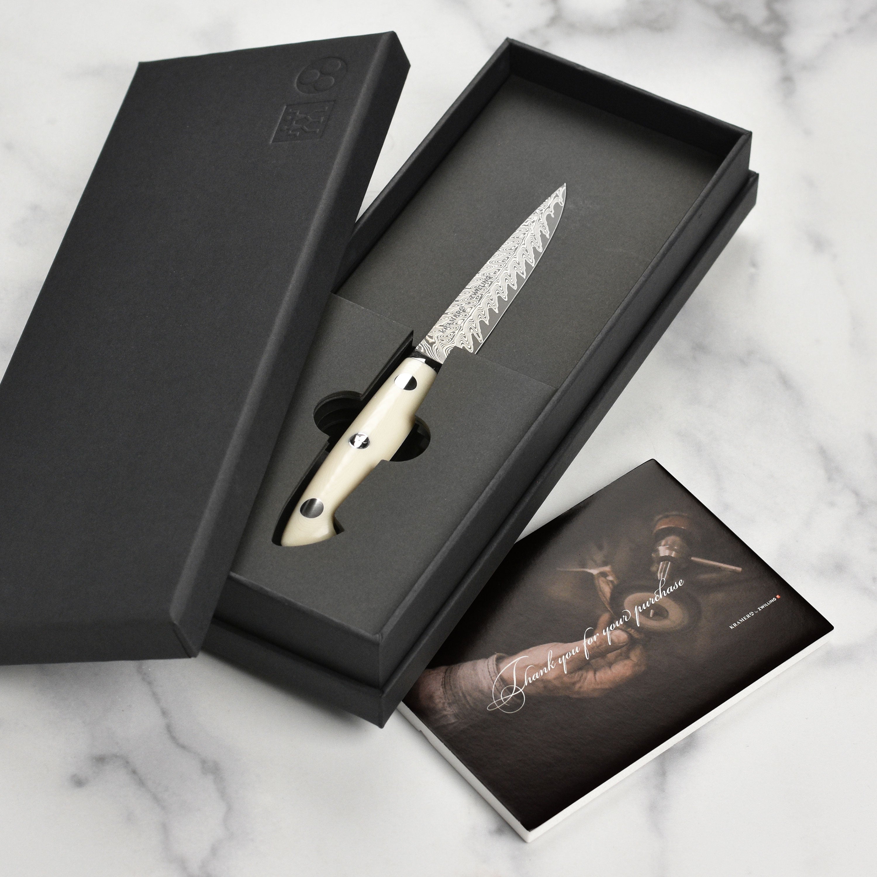 Kramer Cumulus 4-inch Japanese paring knife with Damascus blade and white micarta handle