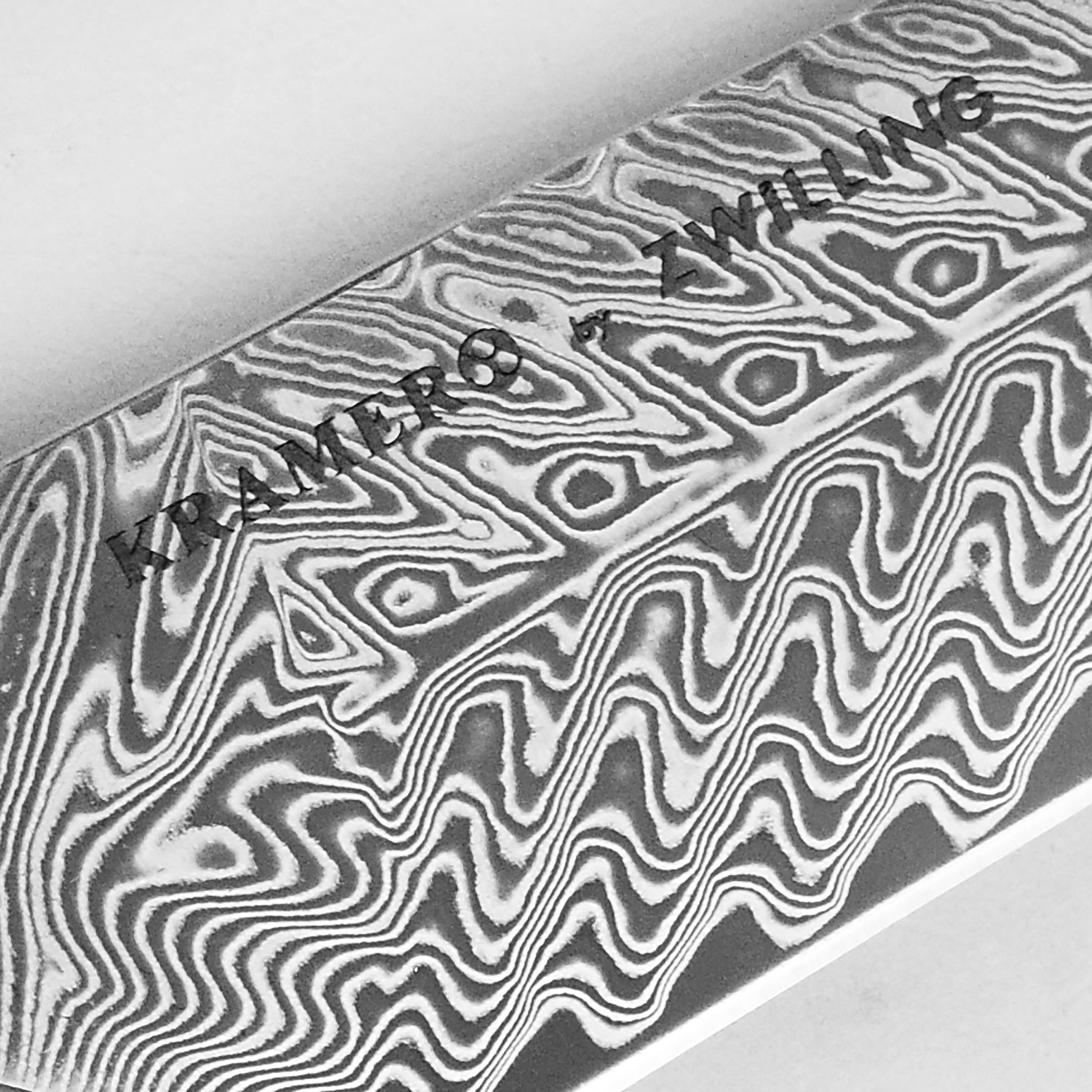 Kramer Cumulus Damascus utility knife with layered blade and ergonomic handle