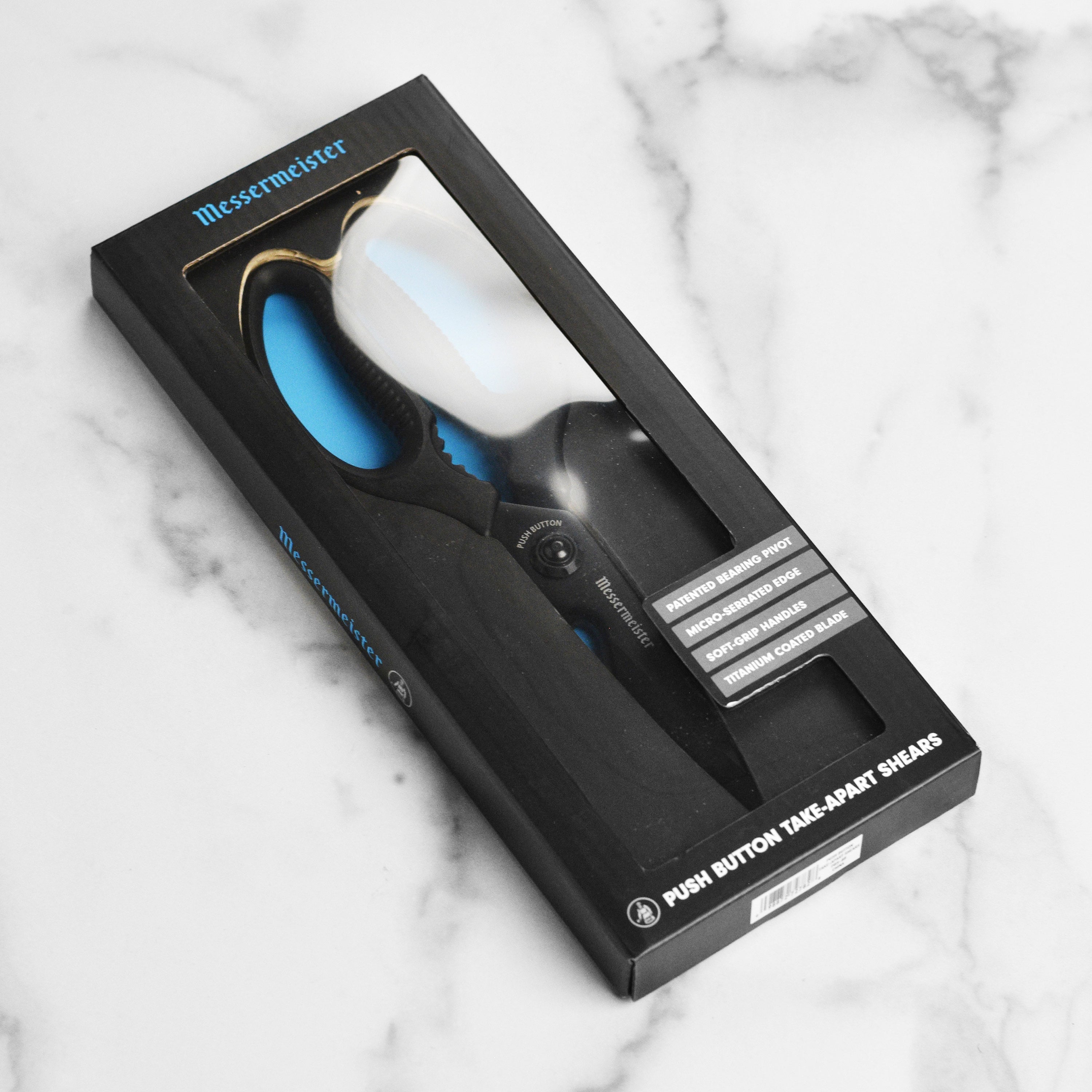 Titan shears in use as a bottle opener during a weekend barbecue