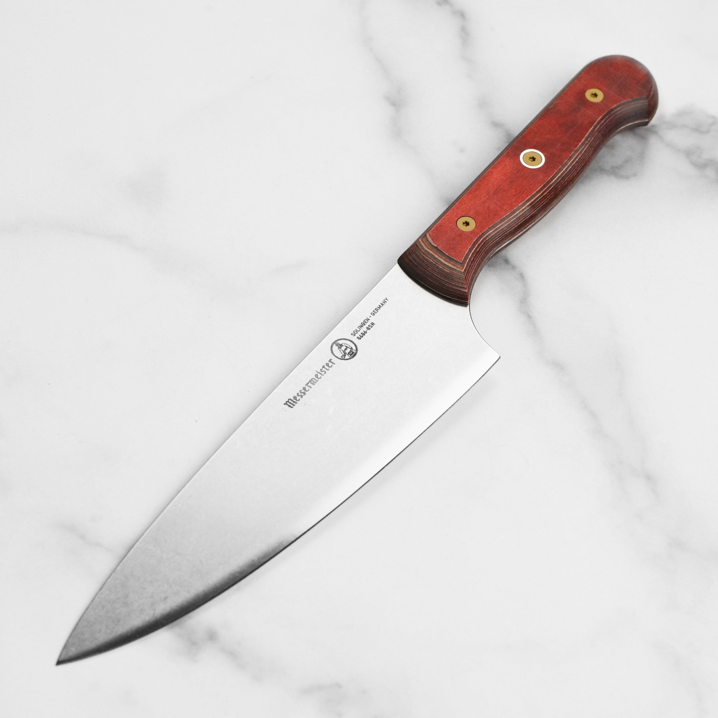 Messermeister ProEdge Terra Red 8-inch chef's knife with detailed blade view