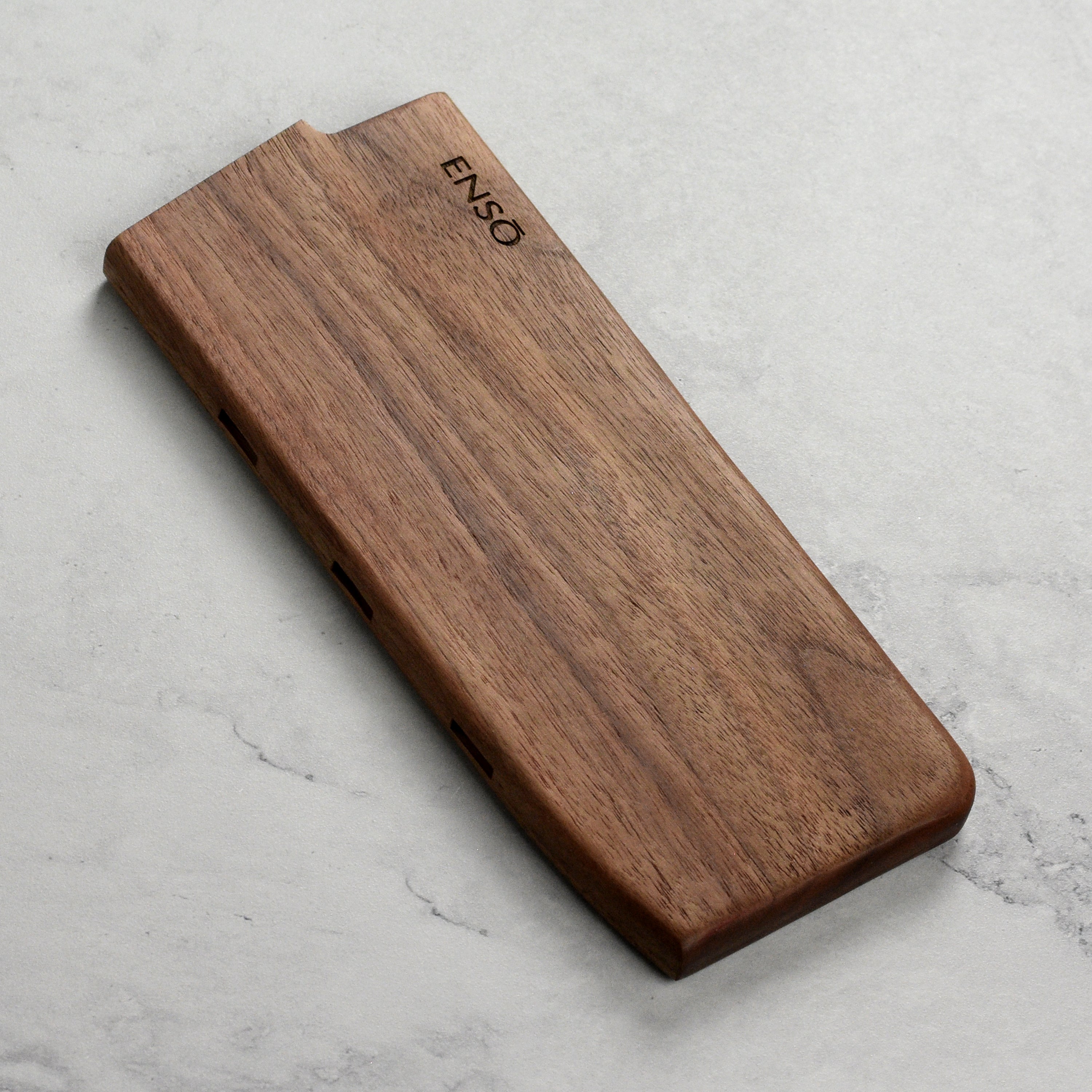 Enso walnut magnetic knife guard showcasing its elegant design and secure fit for 7 inch chef knives.
