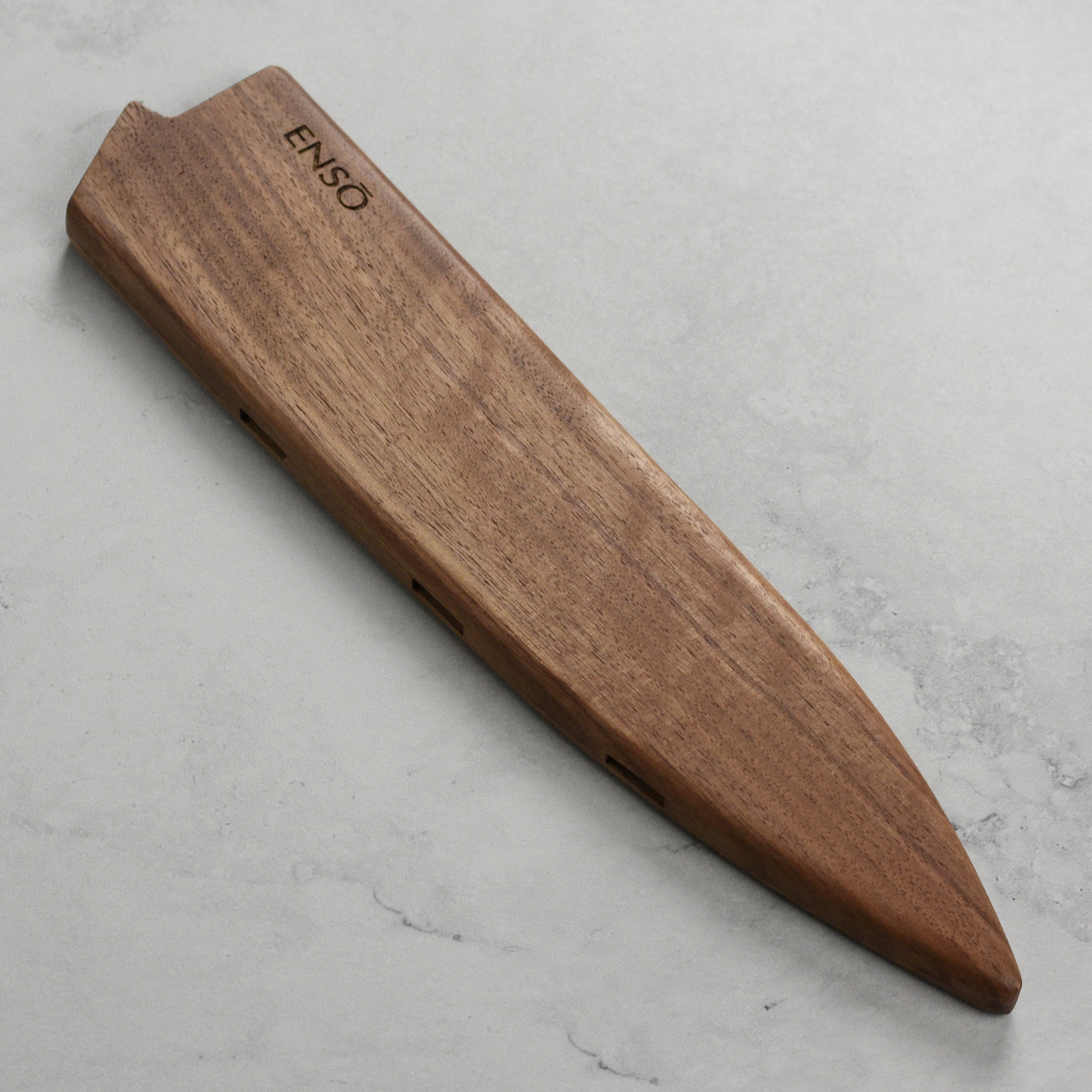 Front view of the premium walnut magnetic knife sheath for 9.5 inch chef knife, showcasing its sleek design and strong magnets.