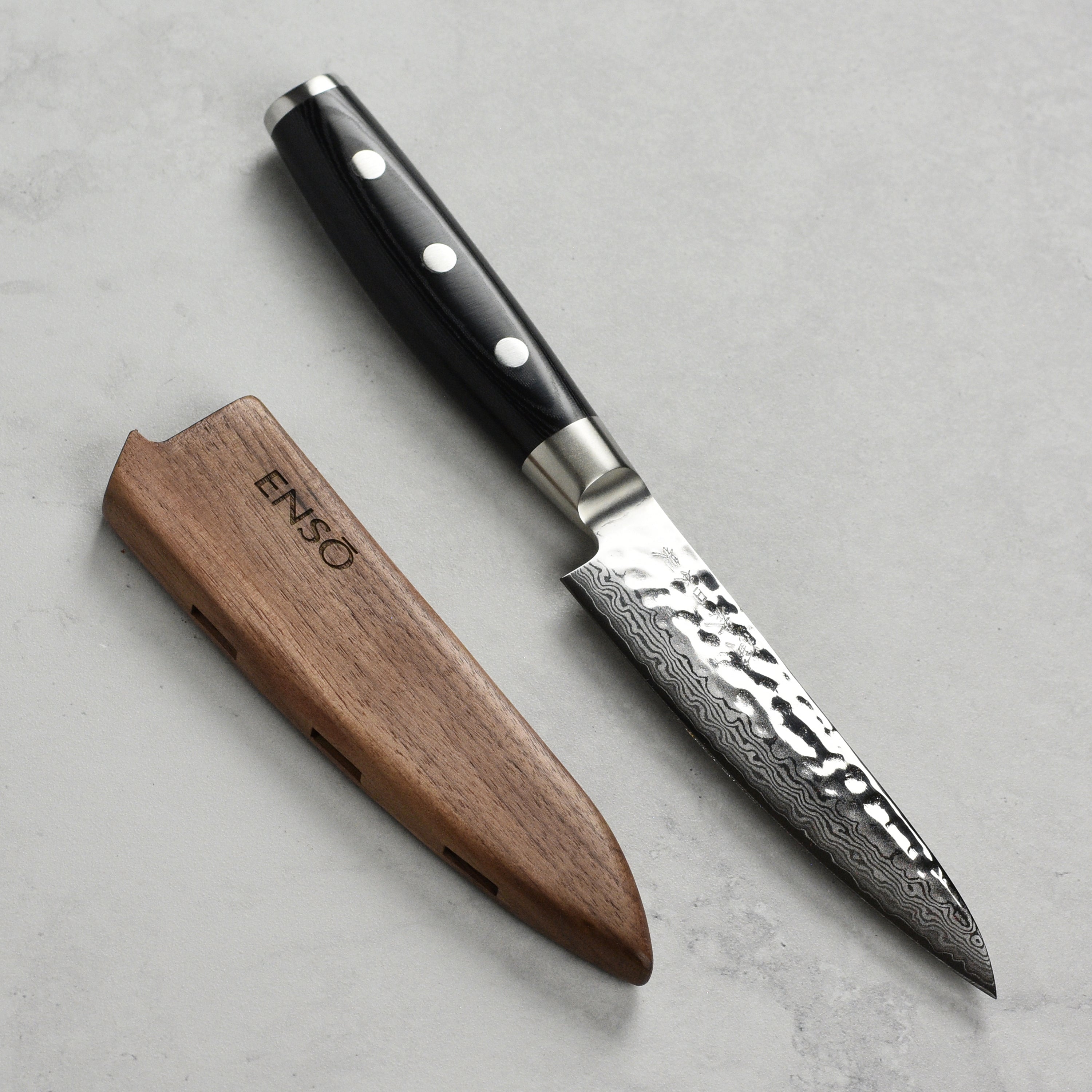 Walnut magnetic knife sheath showcasing its sleek design and magnetic strength.