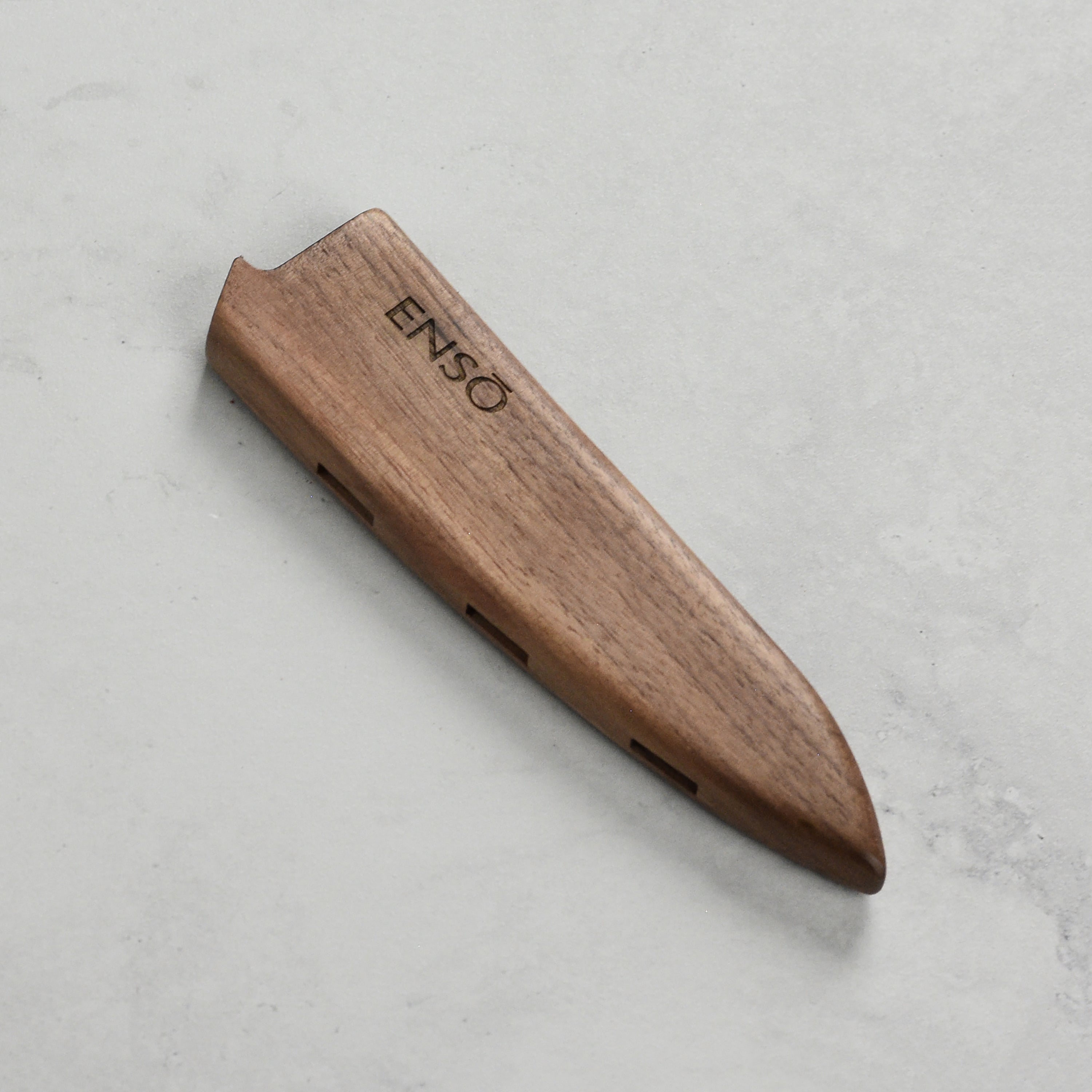 Walnut magnetic knife sheath showcasing its sleek design and magnetic strength.