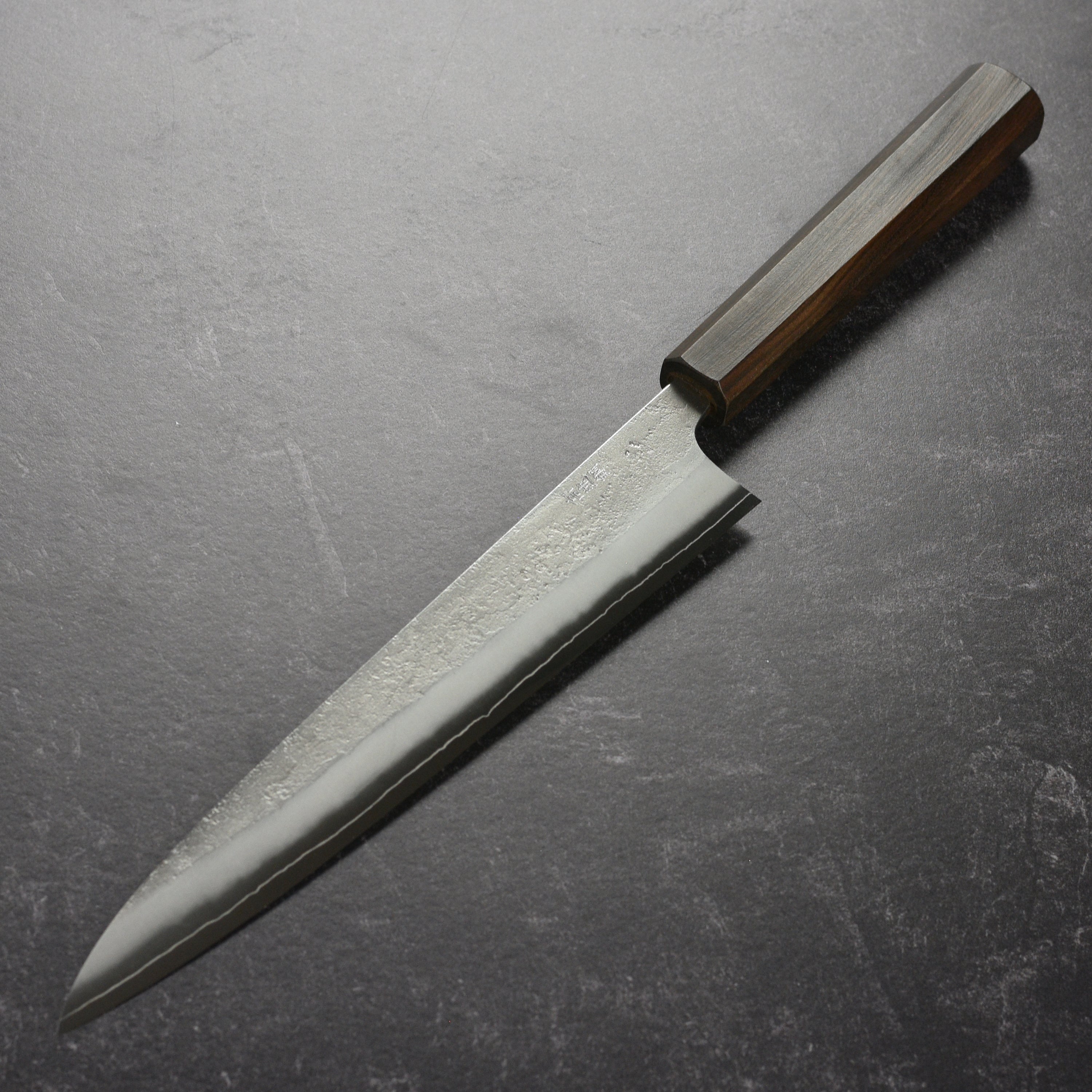 Top view of the 9.4-inch Japanese sujihiki knife with ergonomic handle