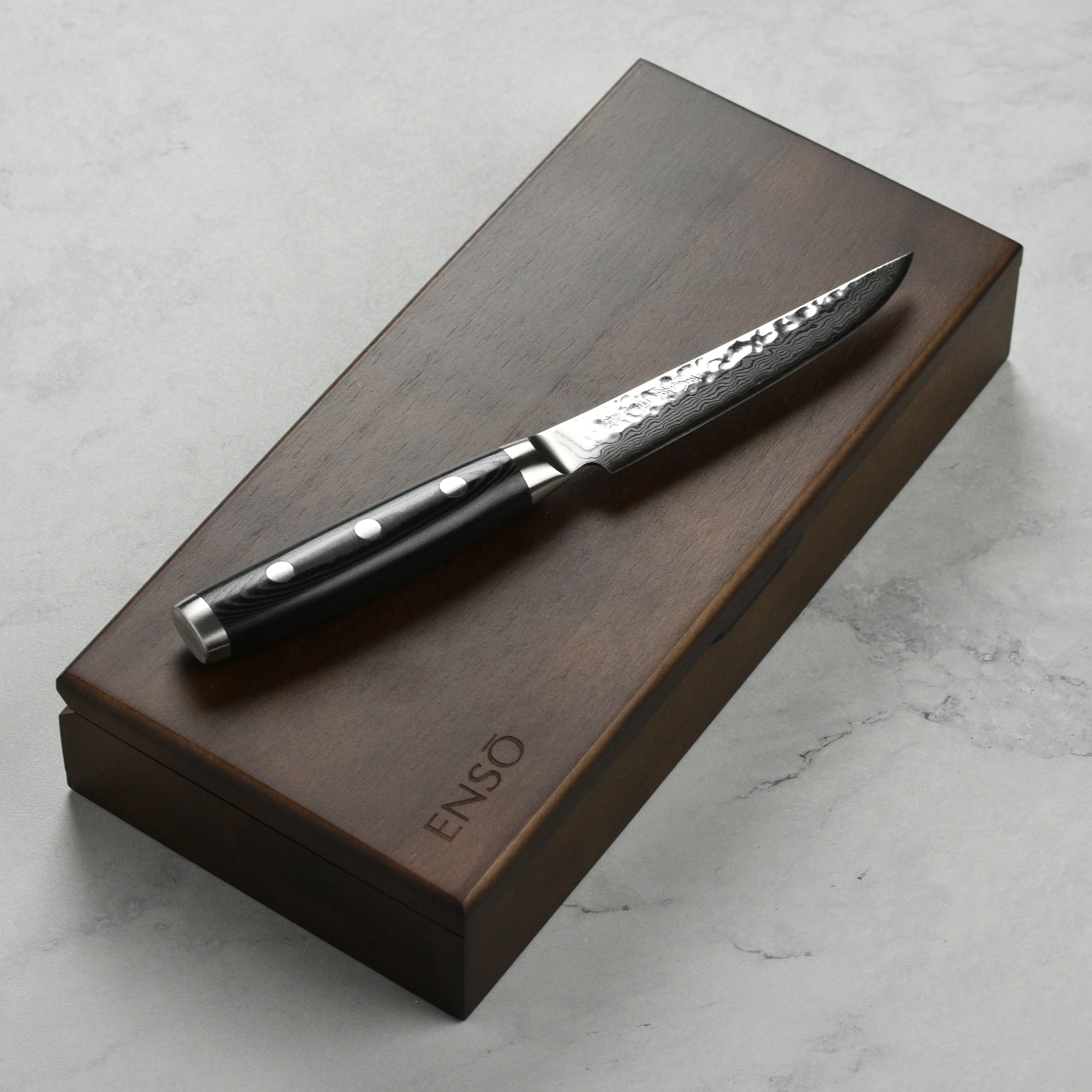 The complete set of Seki Master steak knives displayed in a premium case, perfect for gifting.