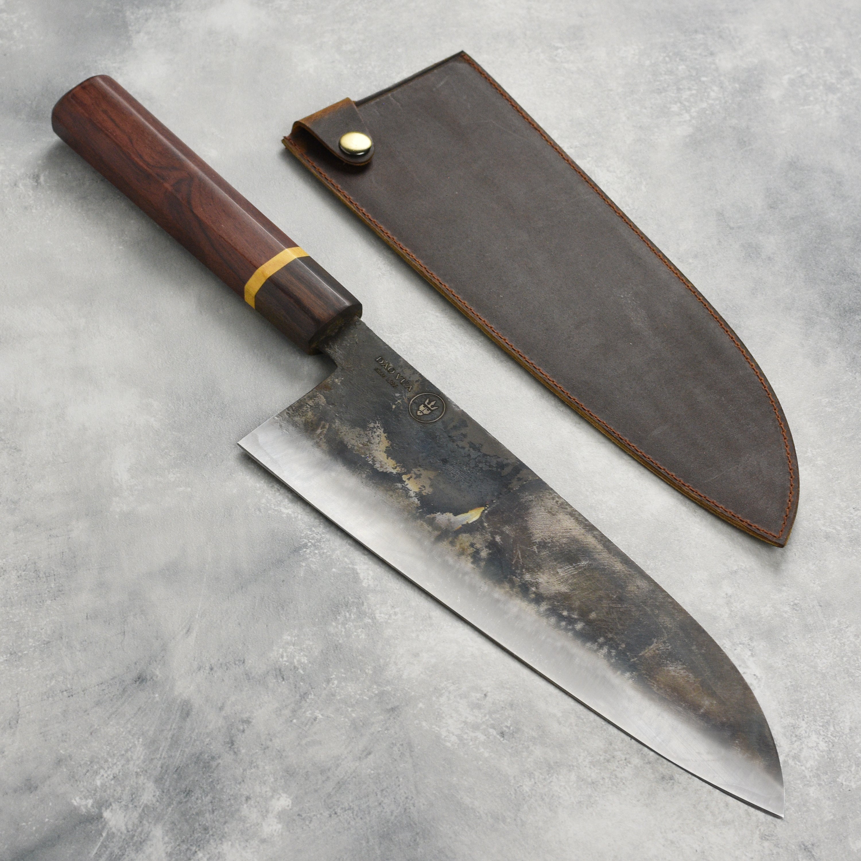 Dao Vua V3 gyuto knife showcasing sharp carbon steel blade and ergonomic handle.
