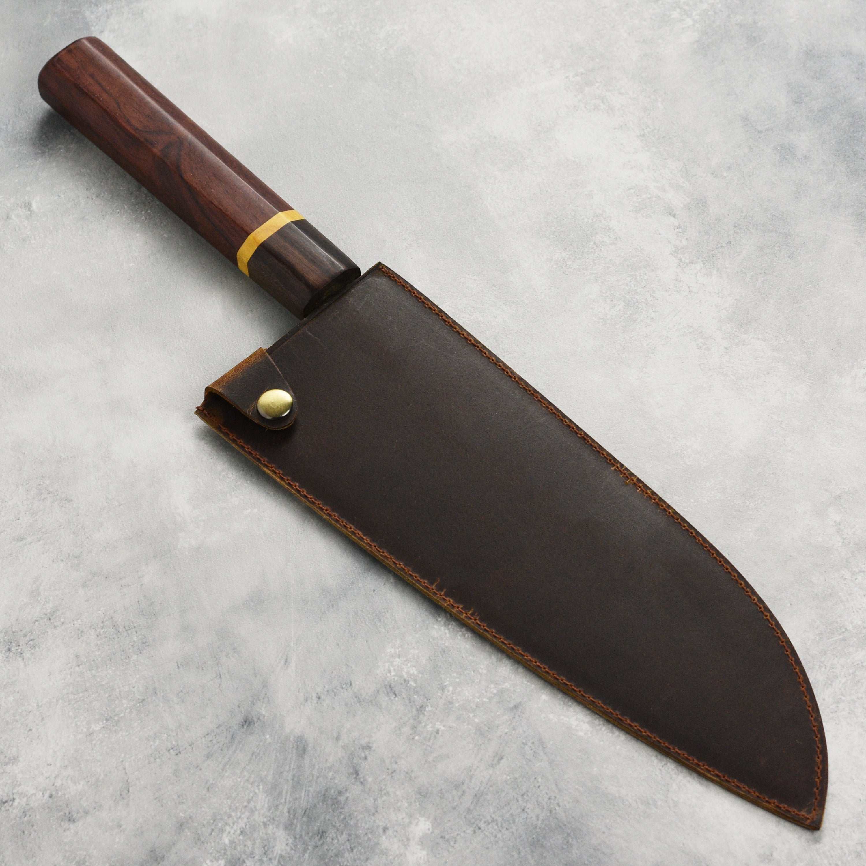 Close-up of Dao Vua V3 gyuto knife highlighting its premium carbon steel quality.