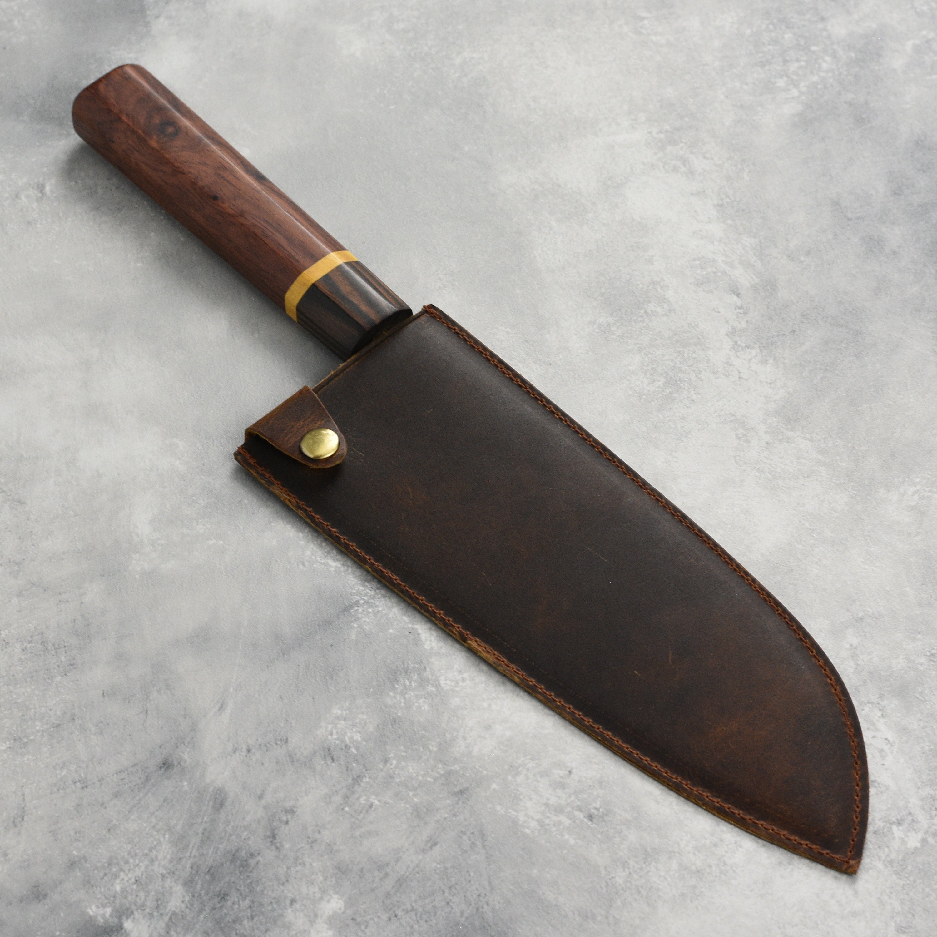 Dao Vua V3 Gyuto Knife in a kitchen setting, demonstrating its versatility for various culinary tasks.