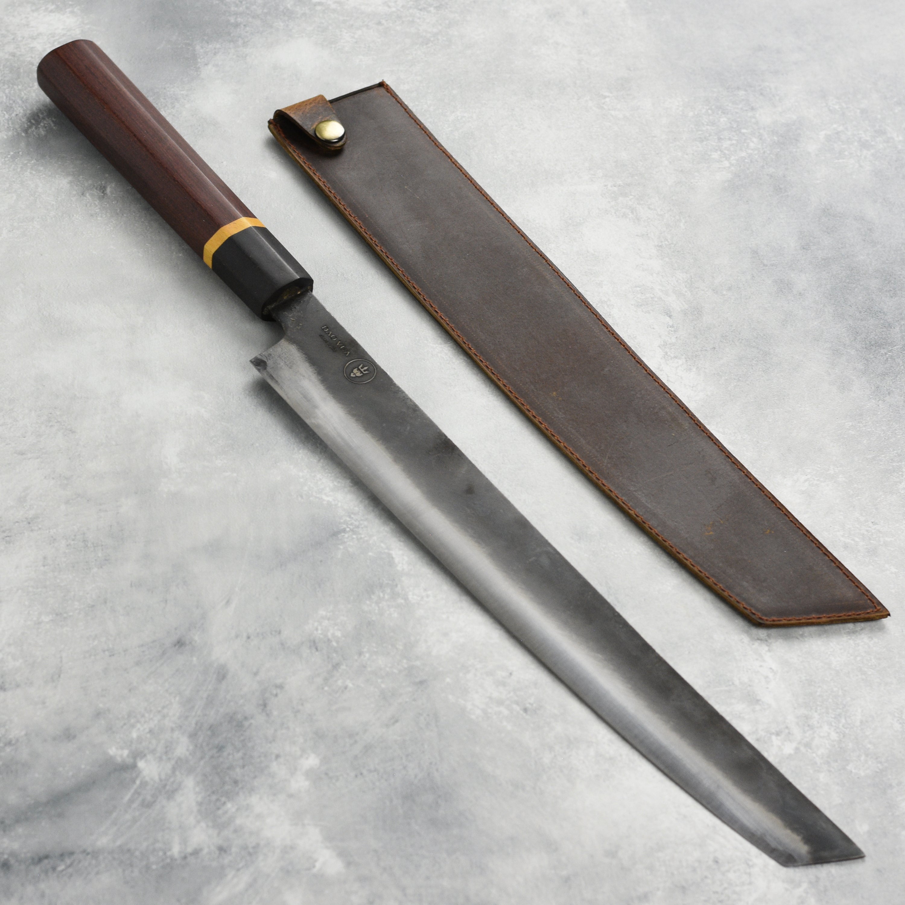 Japanese Sakimaru slicer in use for slicing fish