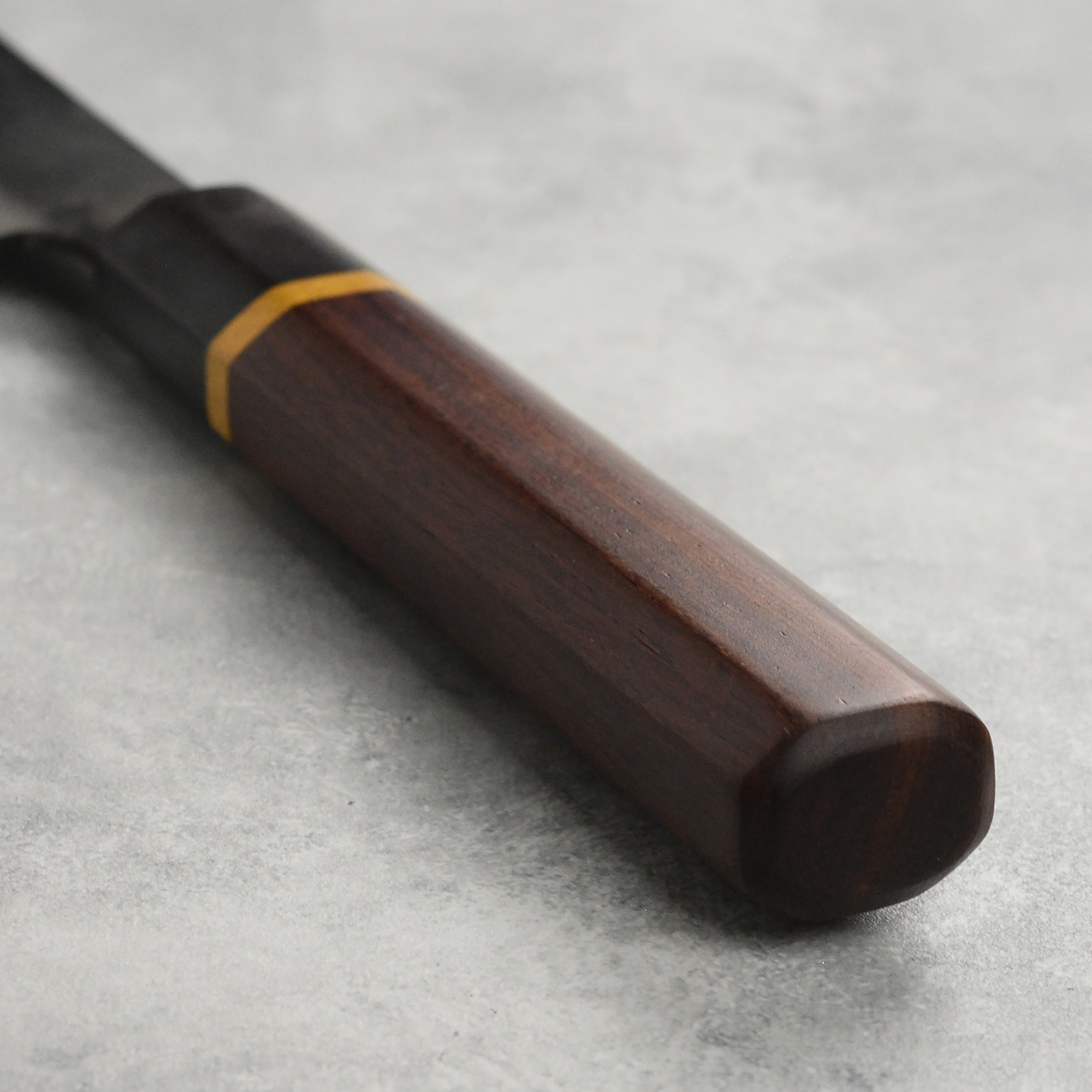 Close-up of a sharp carbon steel knife blade