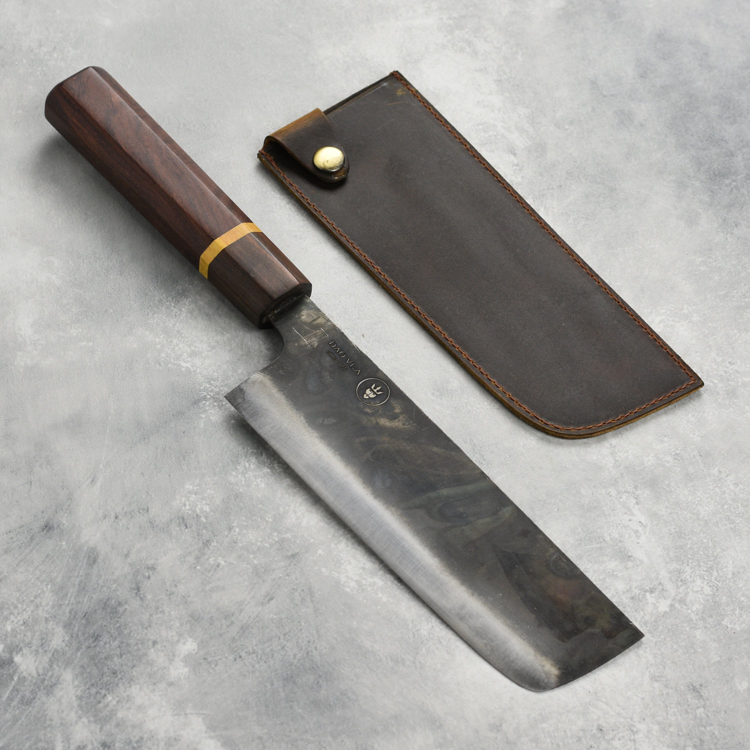 Dao Vua V3 Japanese nakiri knife with high-carbon steel blade and ergonomic handle for precision cutting