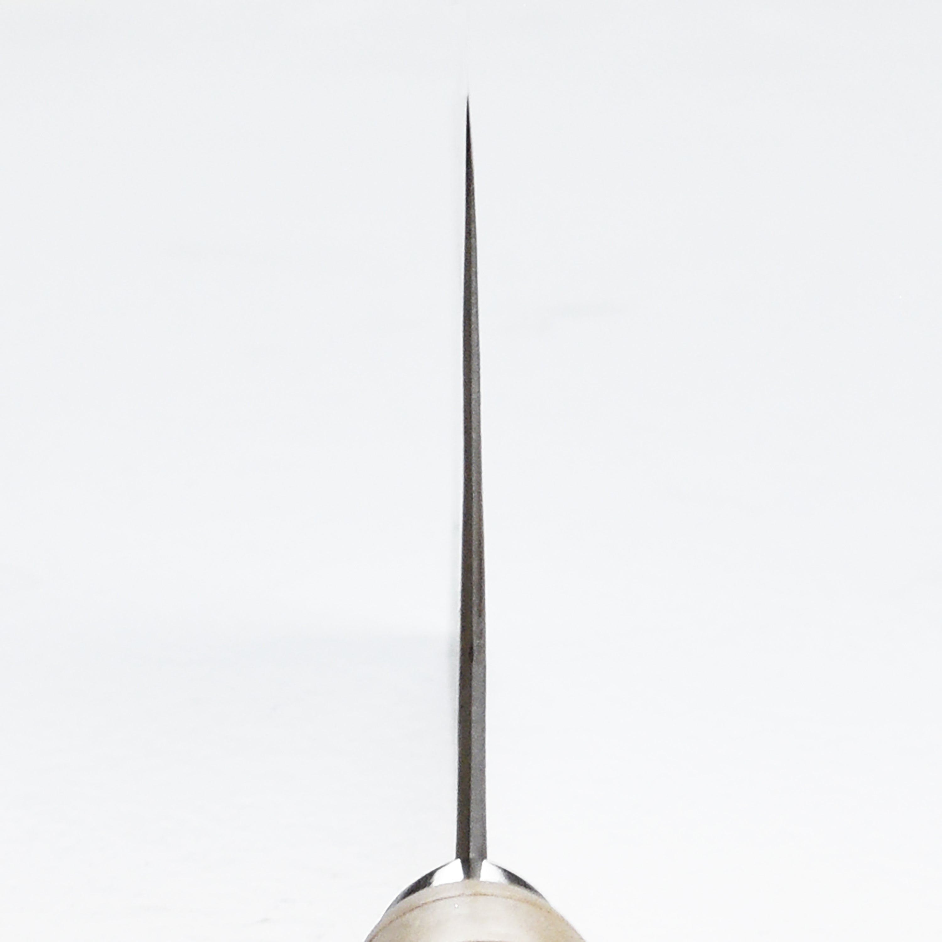Side view of the Rustic Hand-Forged Carbon Steel 8" Chinese Cleaver, highlighting its kurouchi finish and polished edge.