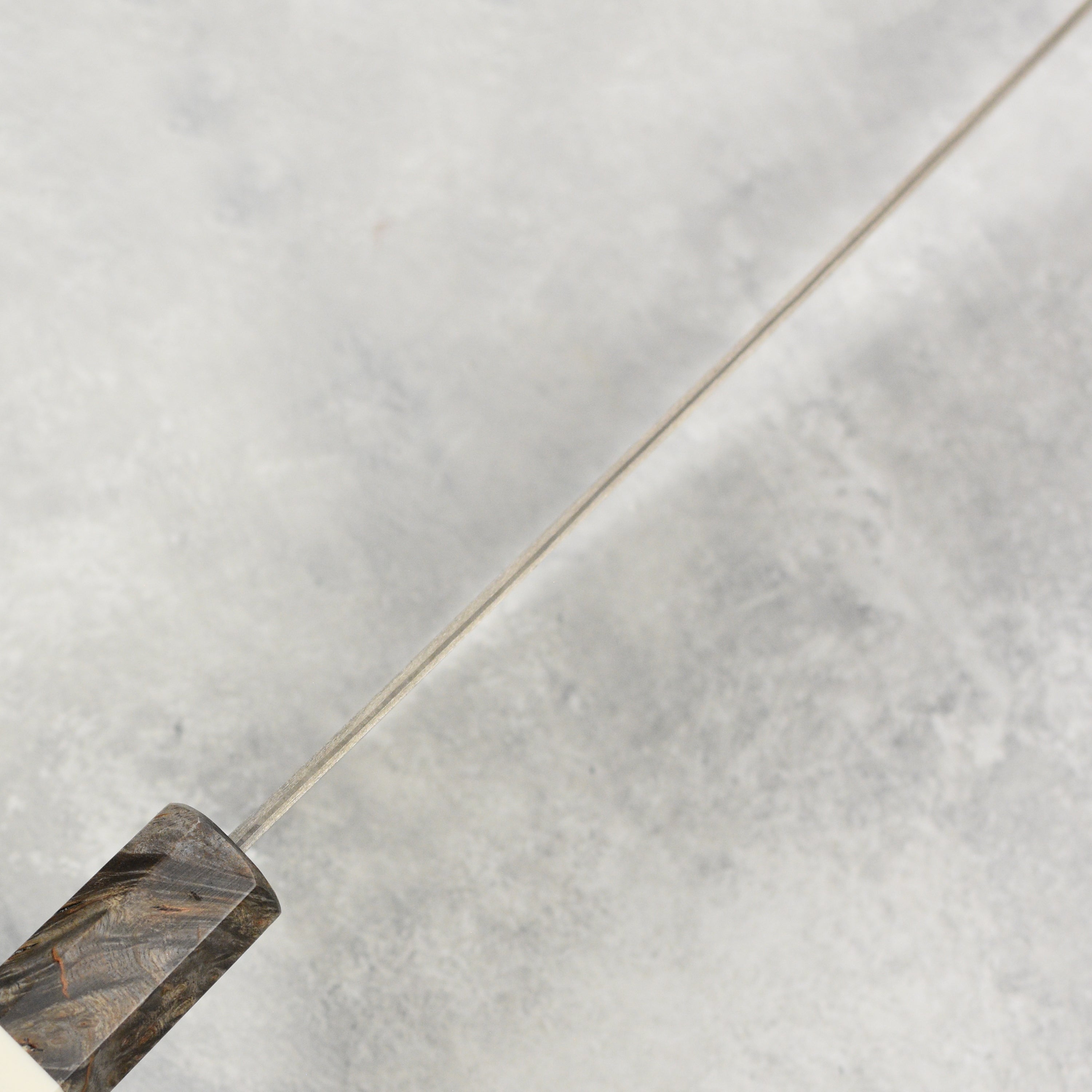 Wooden gift box containing the Takeshi Saji chef knife, perfect for a special occasion.