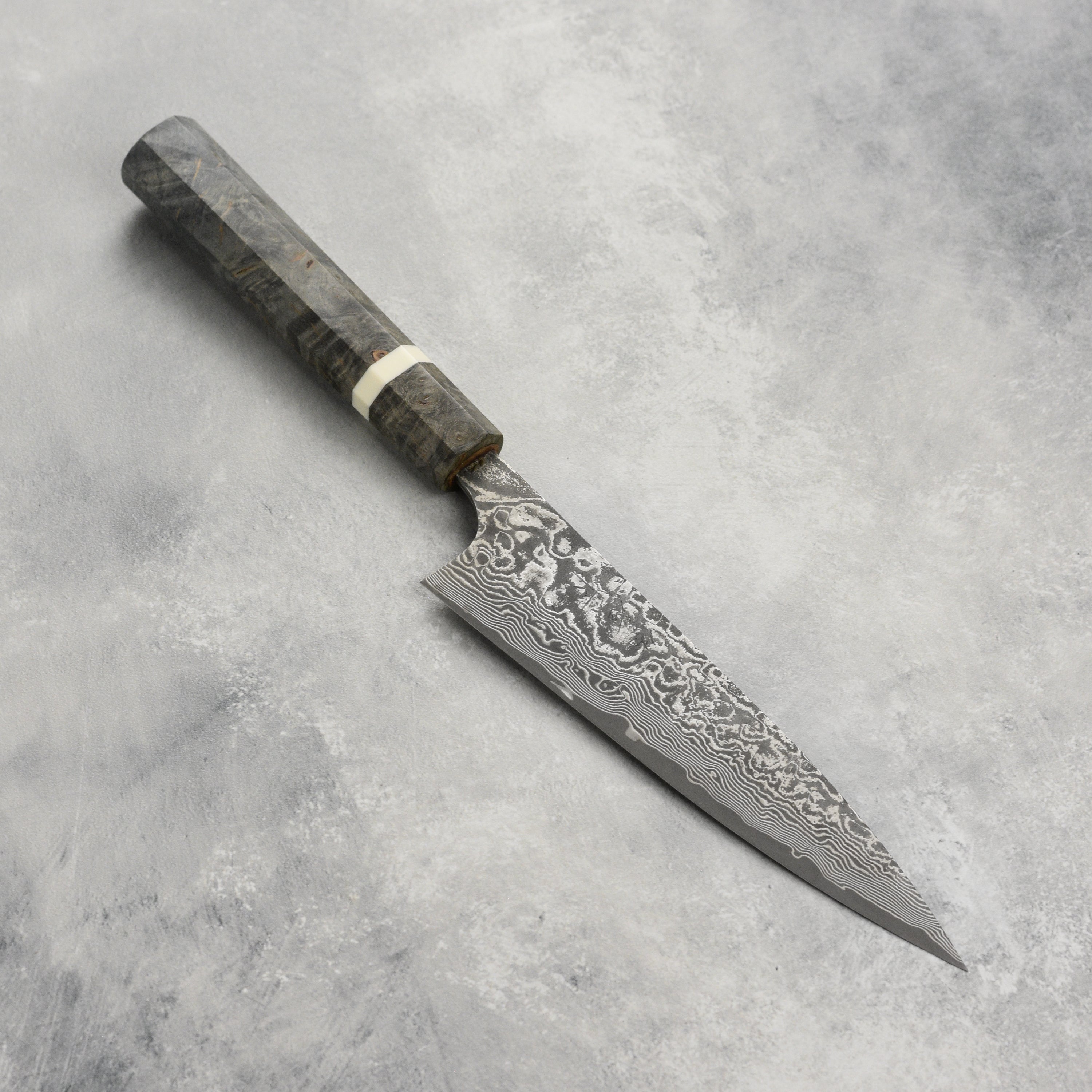 Saji Black Damascus Petty Knife - close-up of the blade and handle showing craftsmanship