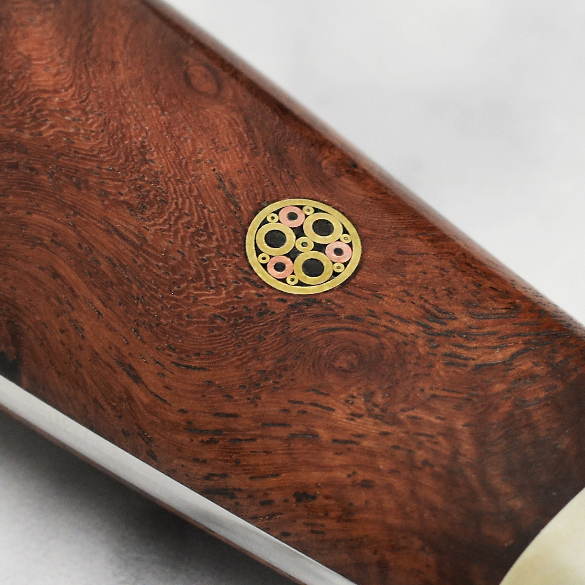 Nigara Anmon SG2 Damascus Kiritsuke knife with detailed blade pattern and quince wood handle for professional use