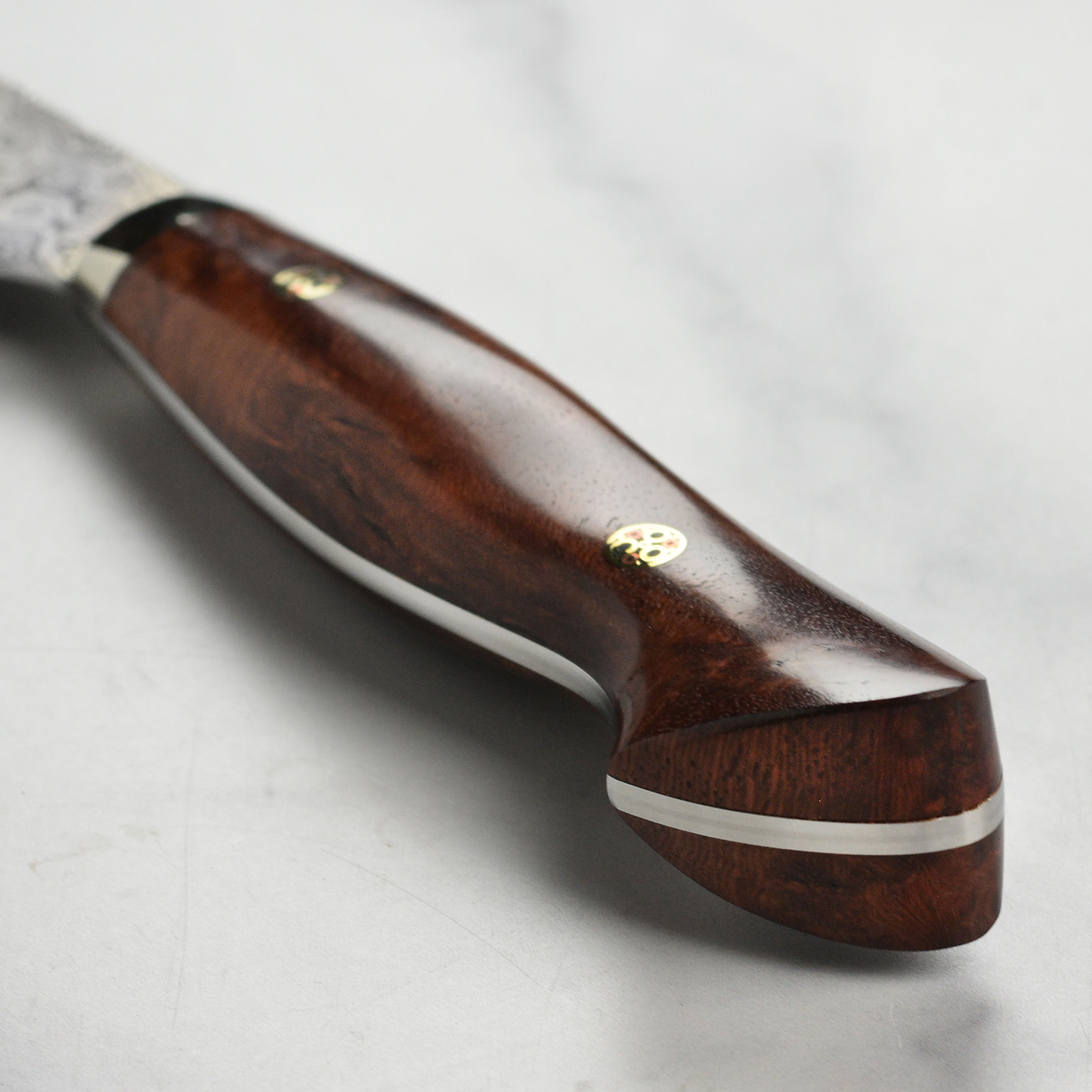 Close-up of the SG2 Damascus Blade of the Sujihiki Knife