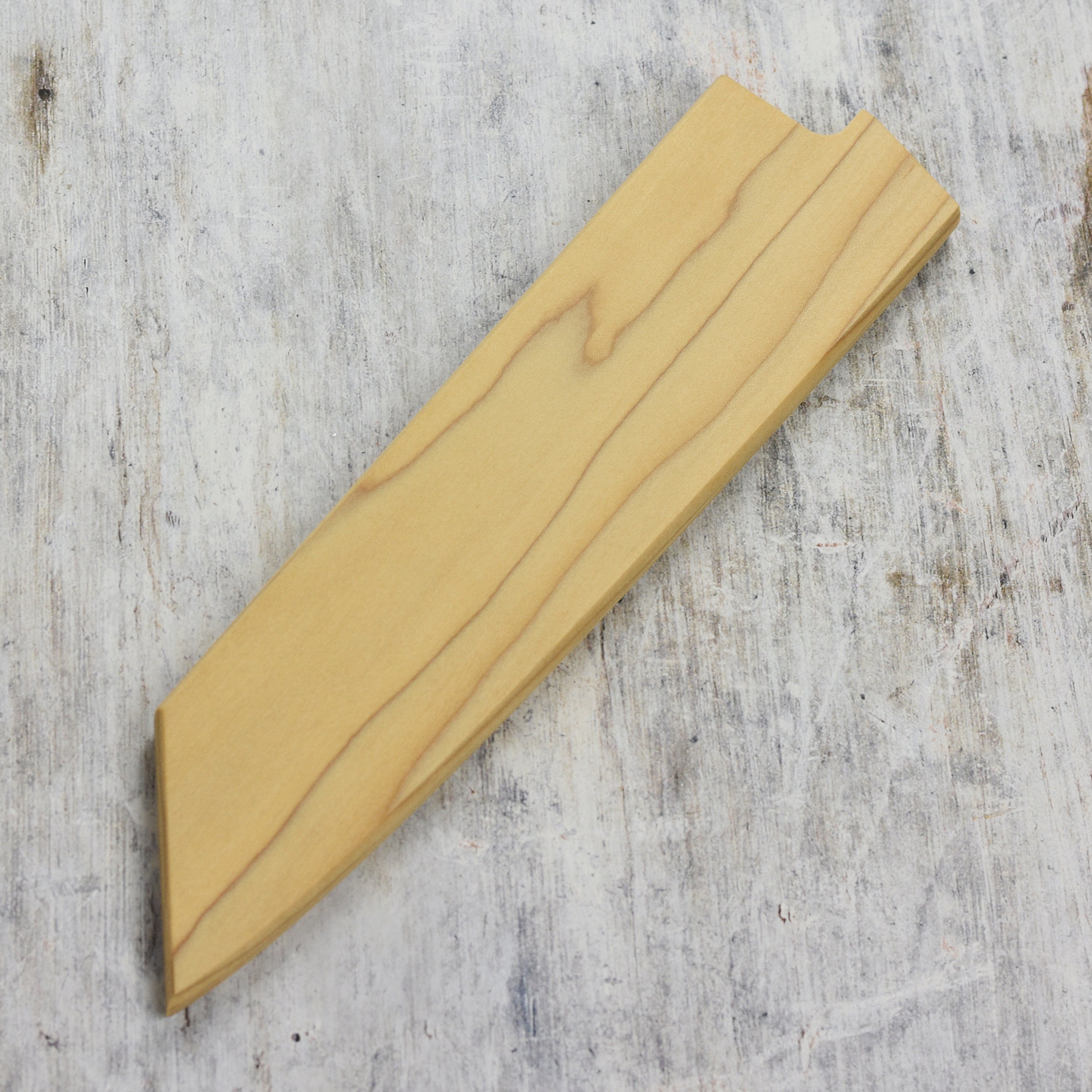 Side angle highlighting the magnetic spine grip for 9.4 inch Kiritsuke compatibility