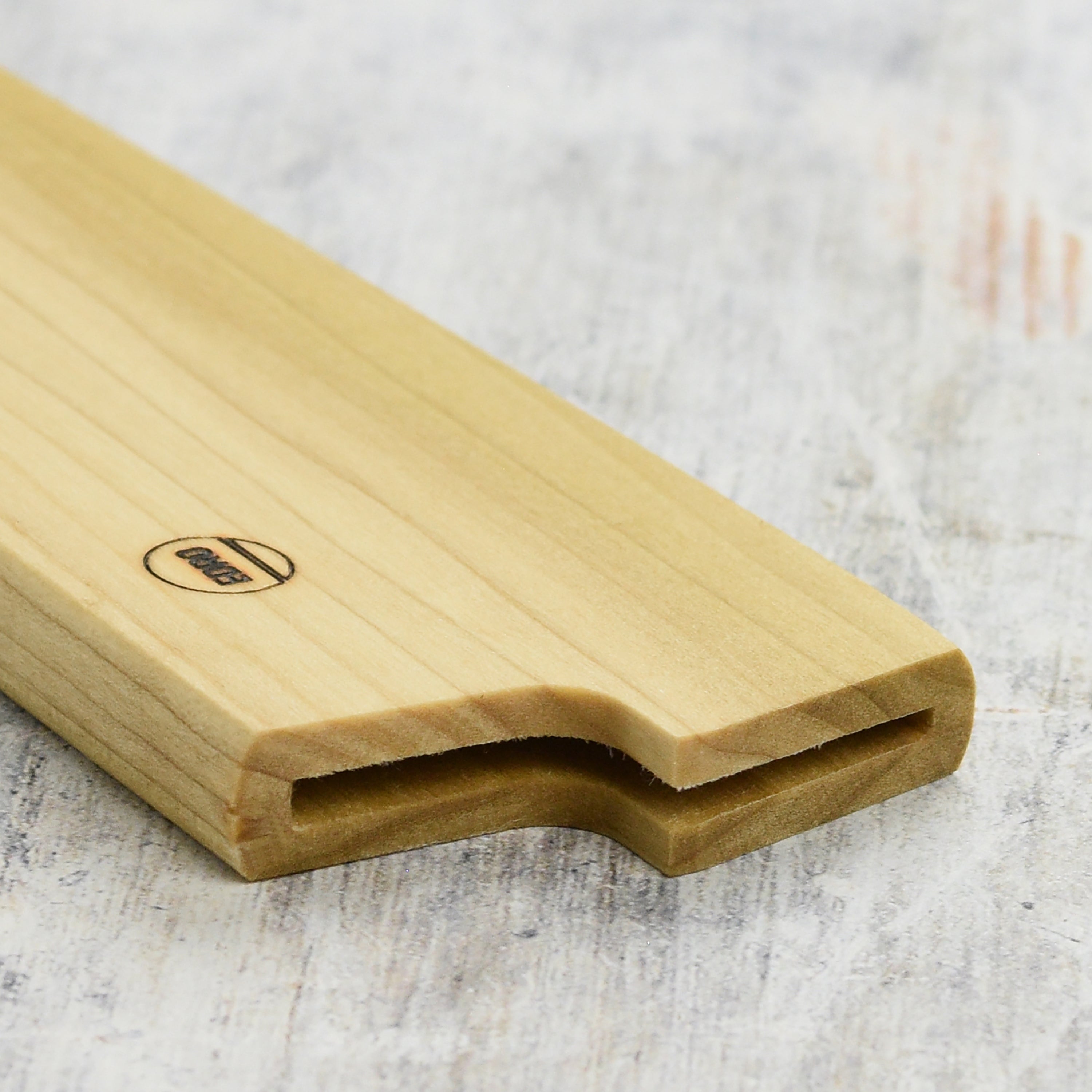 Side profile of the poplar saya for 8.25 inch kiritsuke showing blade entrance and craftsmanship