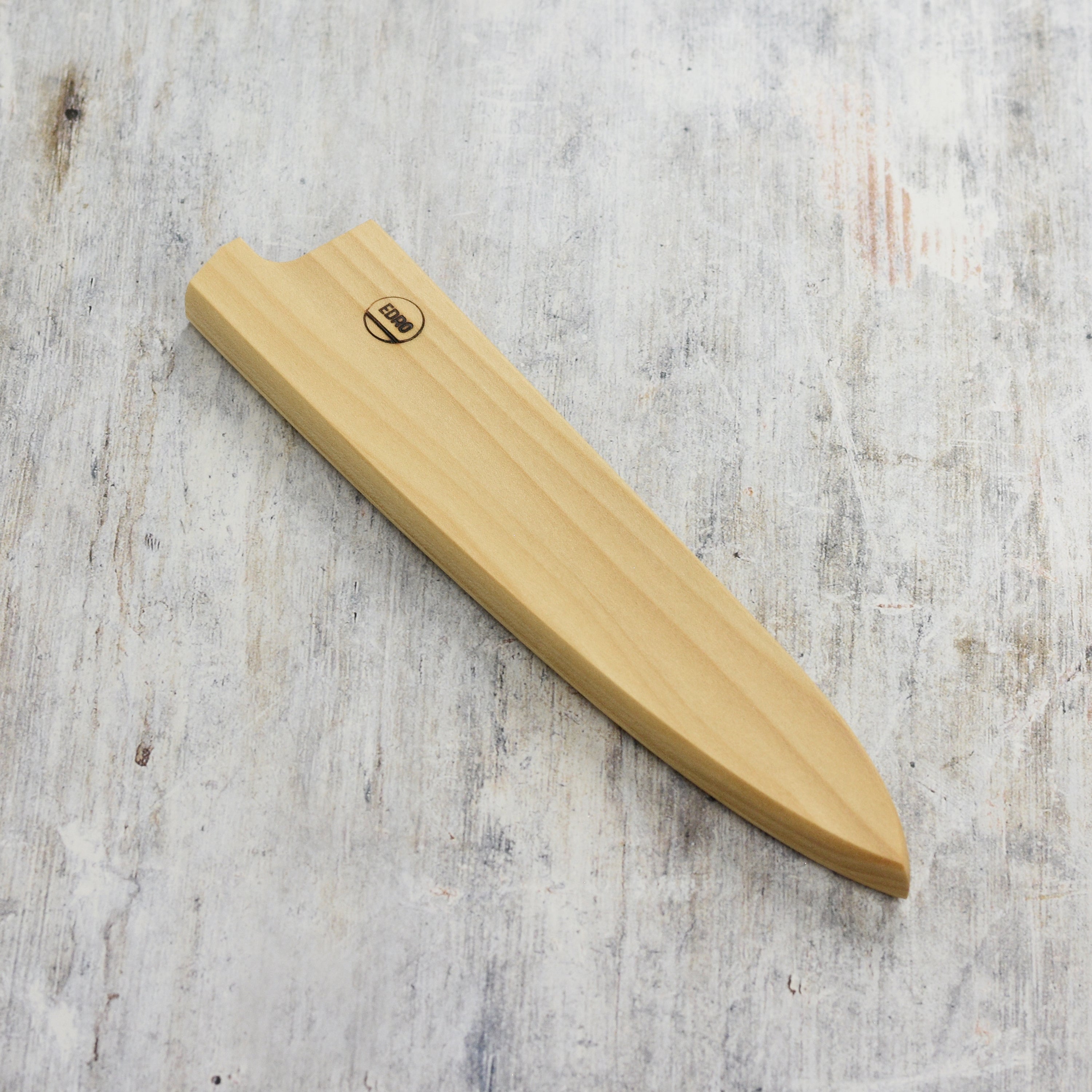 Close-up of premium magnetic knife saya for petty knives, showcasing the neodymium magnet.