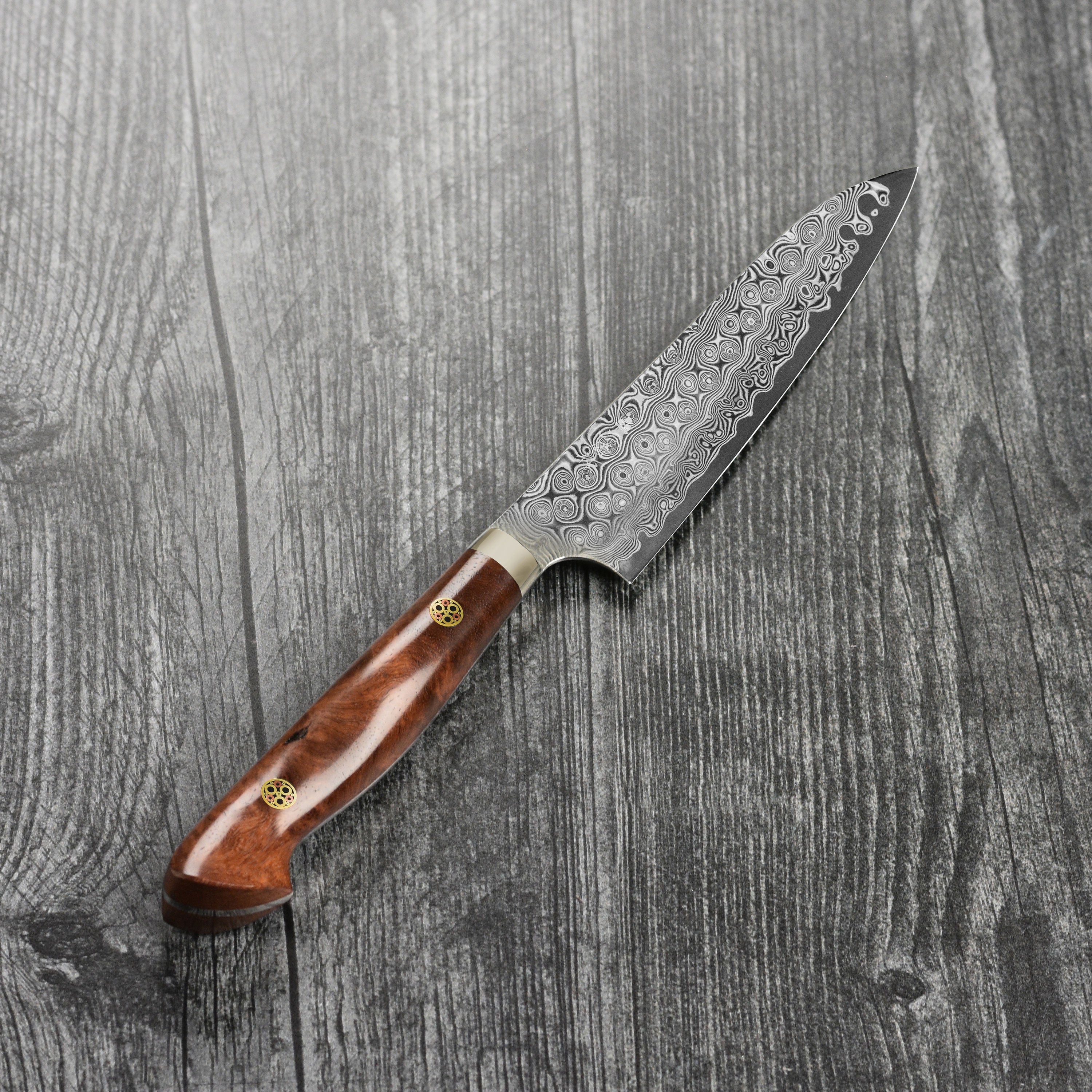 Detail shot of the Damascus steel blade showing intricate patterns for a Damascus knife