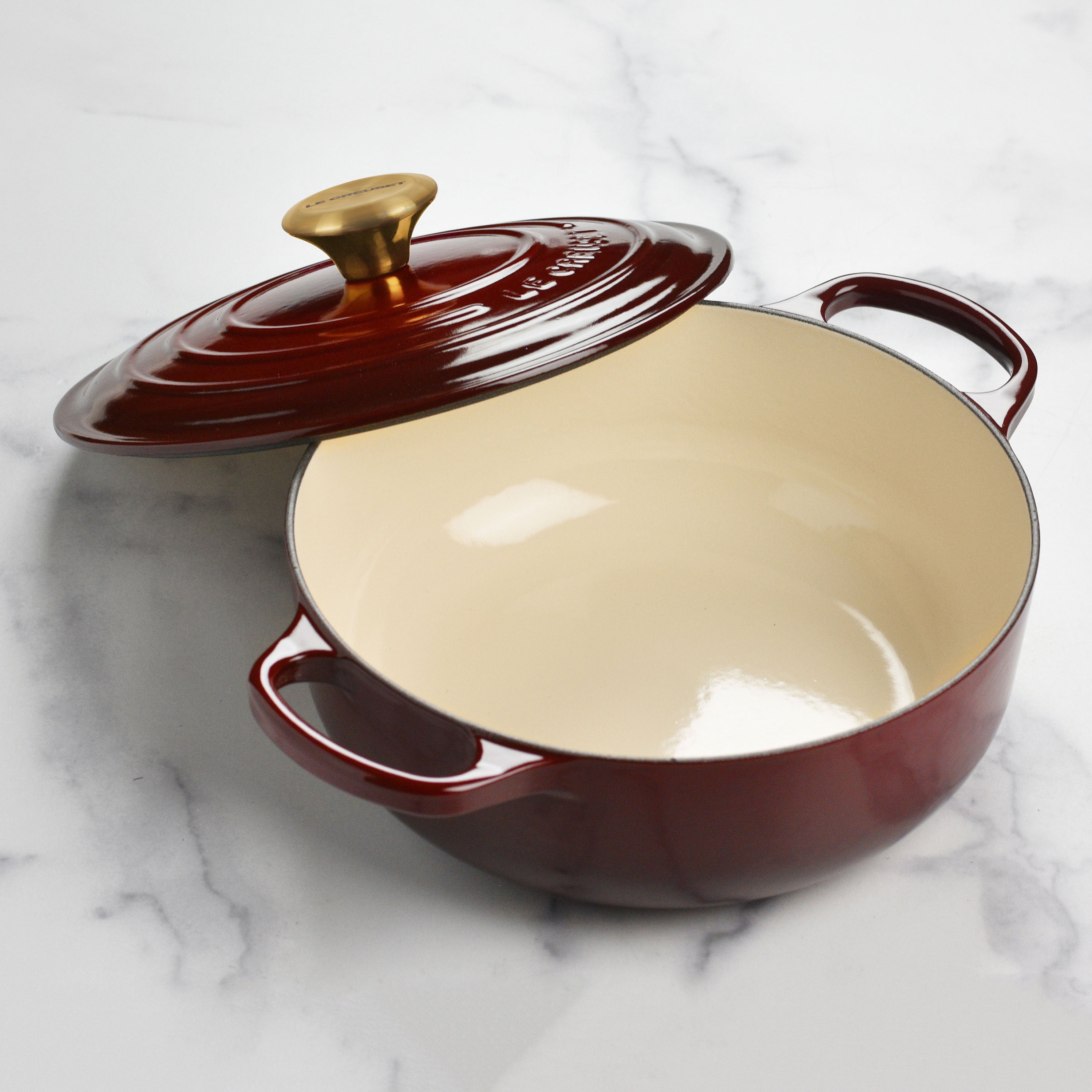 Side view of the premium enameled Dutch oven showcasing its sturdy handles and vibrant color