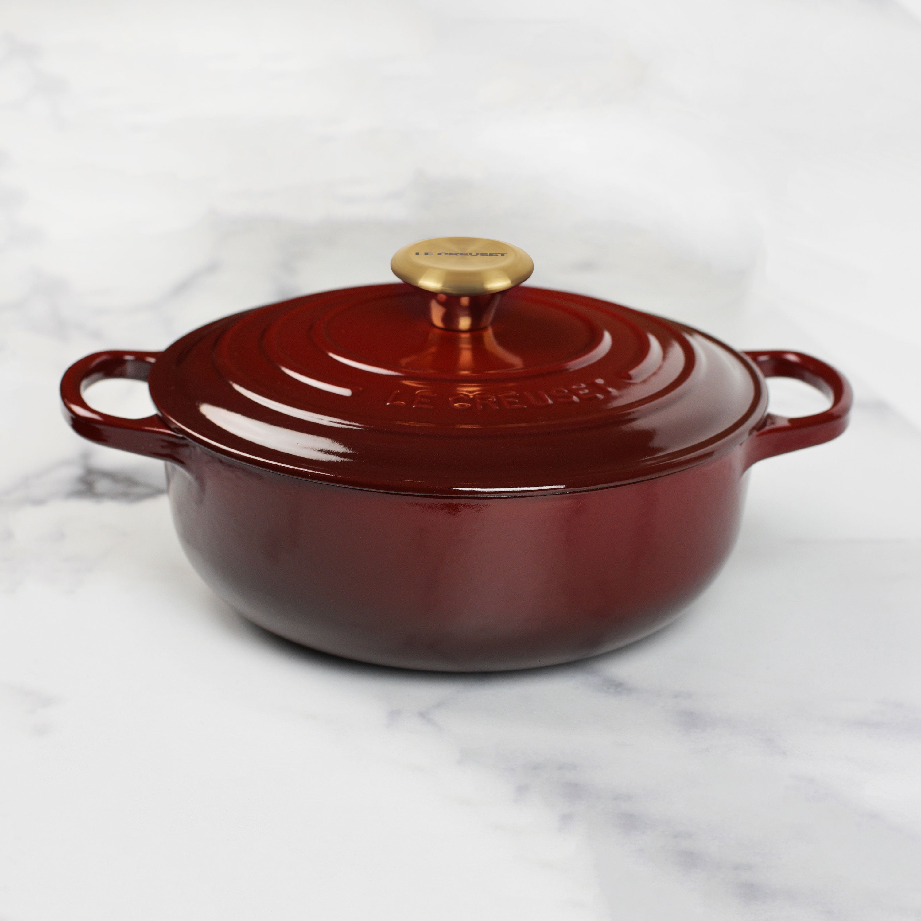Le Creuset 3.5 quart enameled cast iron Dutch oven with lid, ideal for slow-cooking and braising