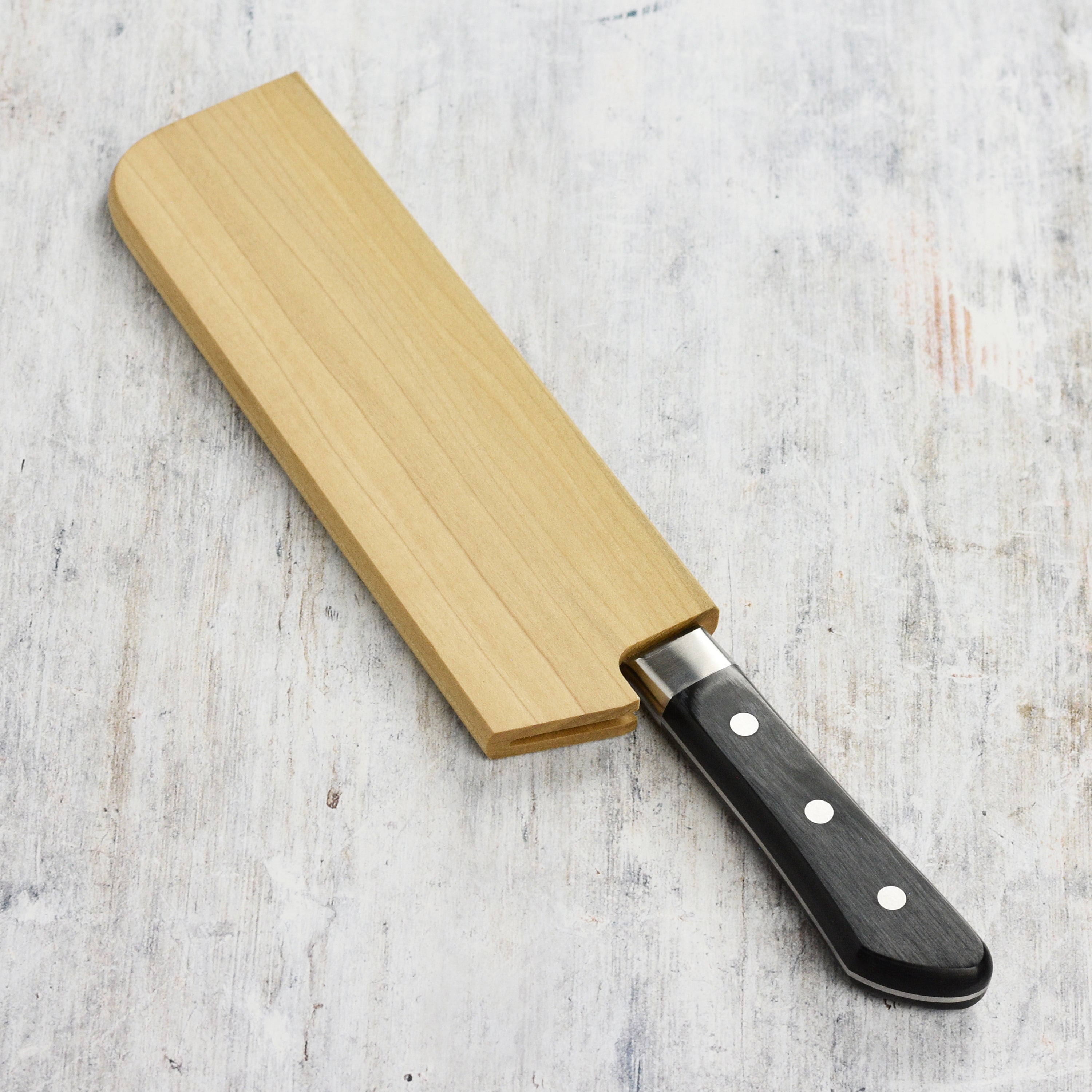 Magnetic knife holder for Japanese knives with Nakiri in a modern kitchen setting