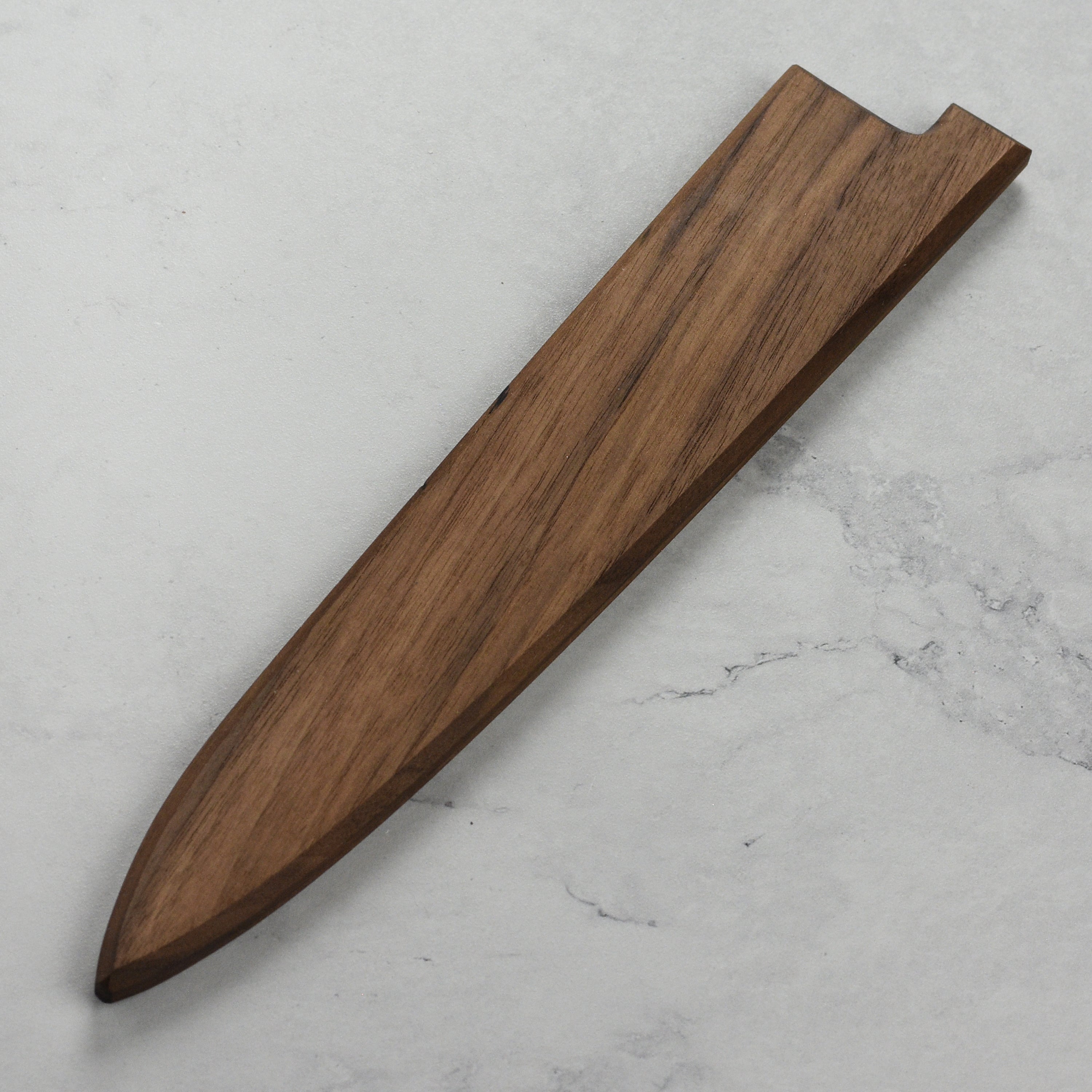 Top-down view of walnut magnetic knife saya fitted to a 9.4" sujihiki knife