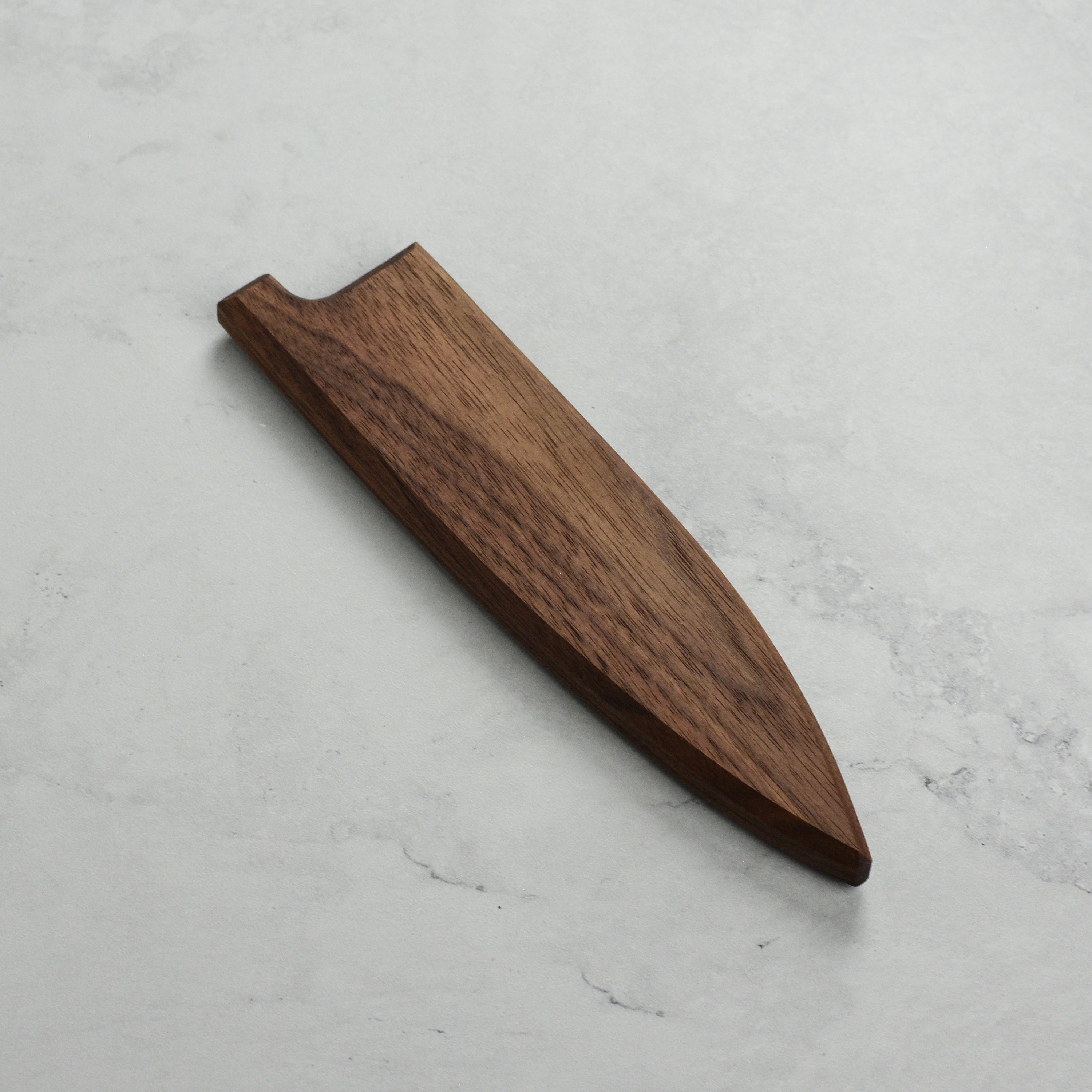 Walnut magnetic saya with petty knife inserted, showing magnetic closure and craftsmanship